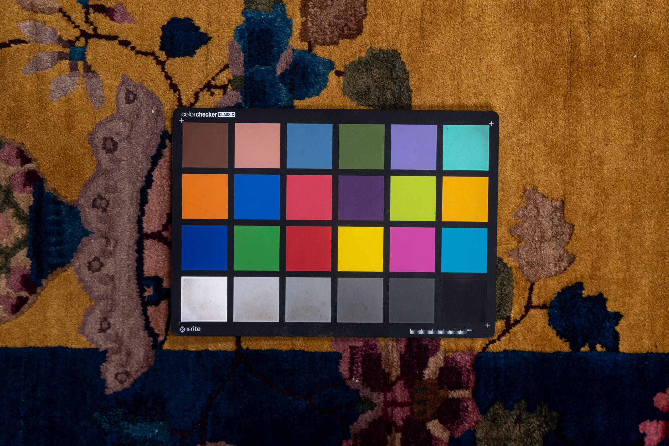 5' x 9' one-of-a-kind handmade vintage Chinese medium size rug. Color palette: blue, brown, dark gray, gray, pink, red, wine