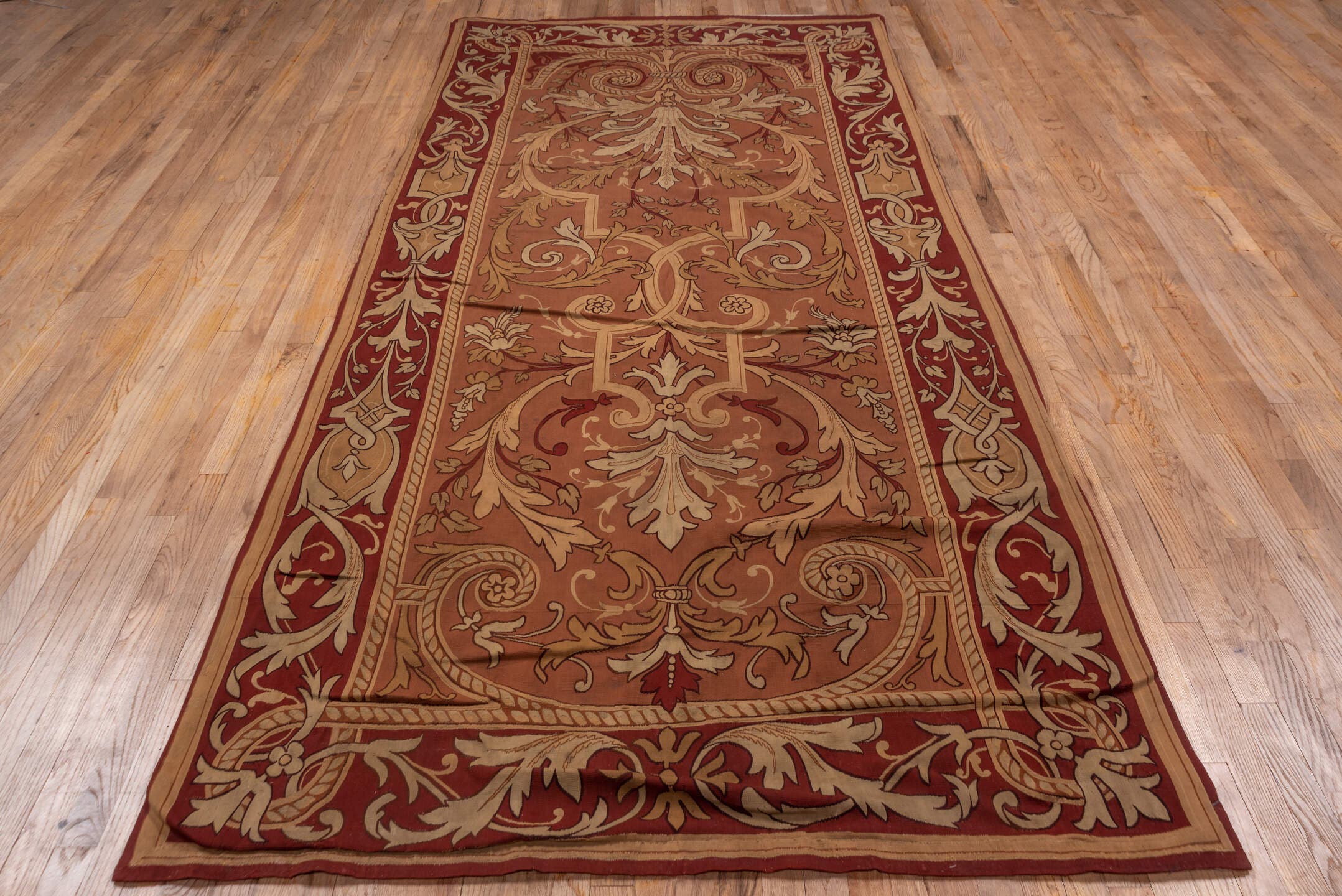 5' x 10' one-of-a-kind handmade antique Aubusson runner rug. Color palette: rose, ivory, burgundy, terra cotta, taupe, camel