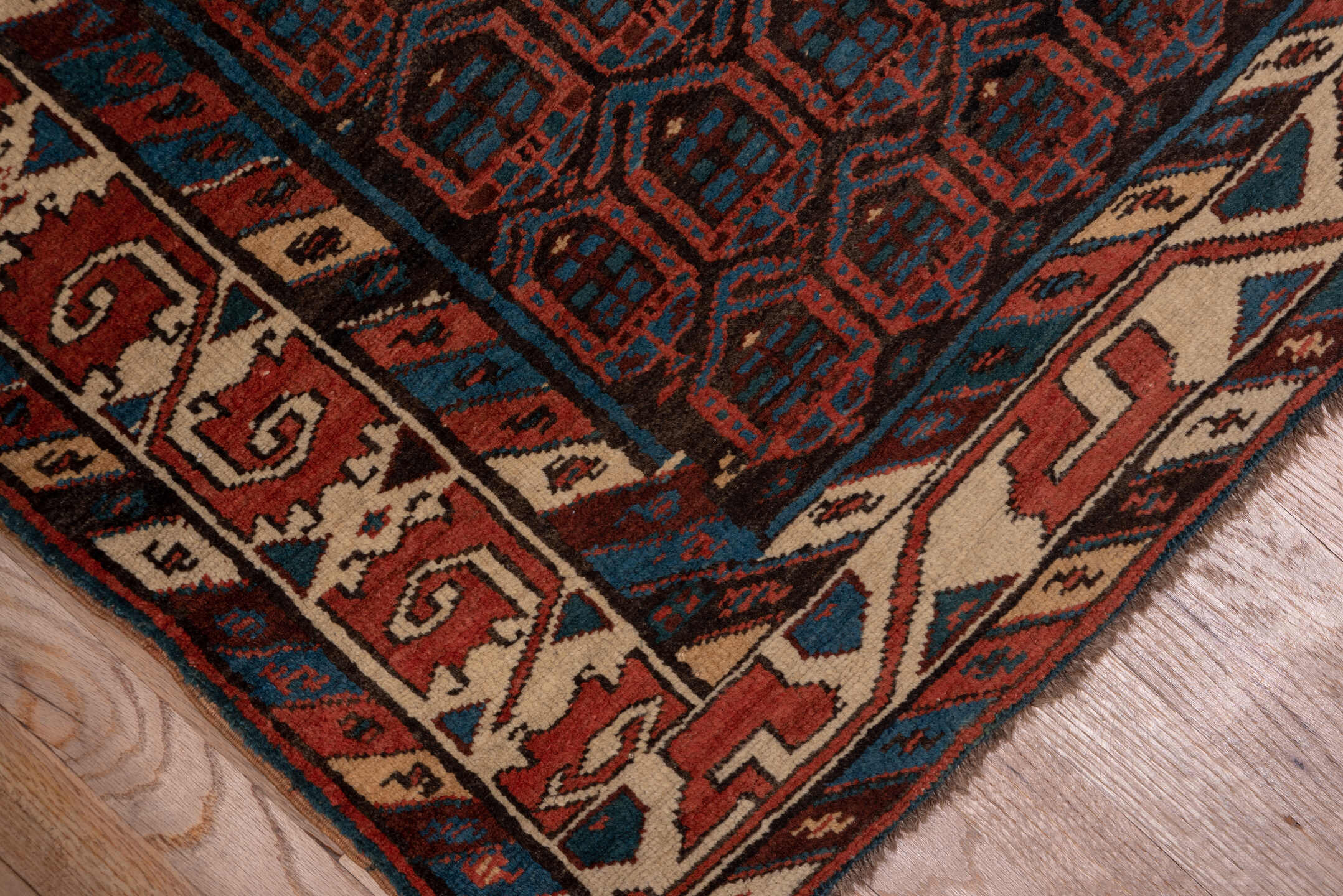3' x 15' one-of-a-kind handmade vintage Sarab runner rug. Color palette: black, blue, brown, charcoal, gray, off-white, red