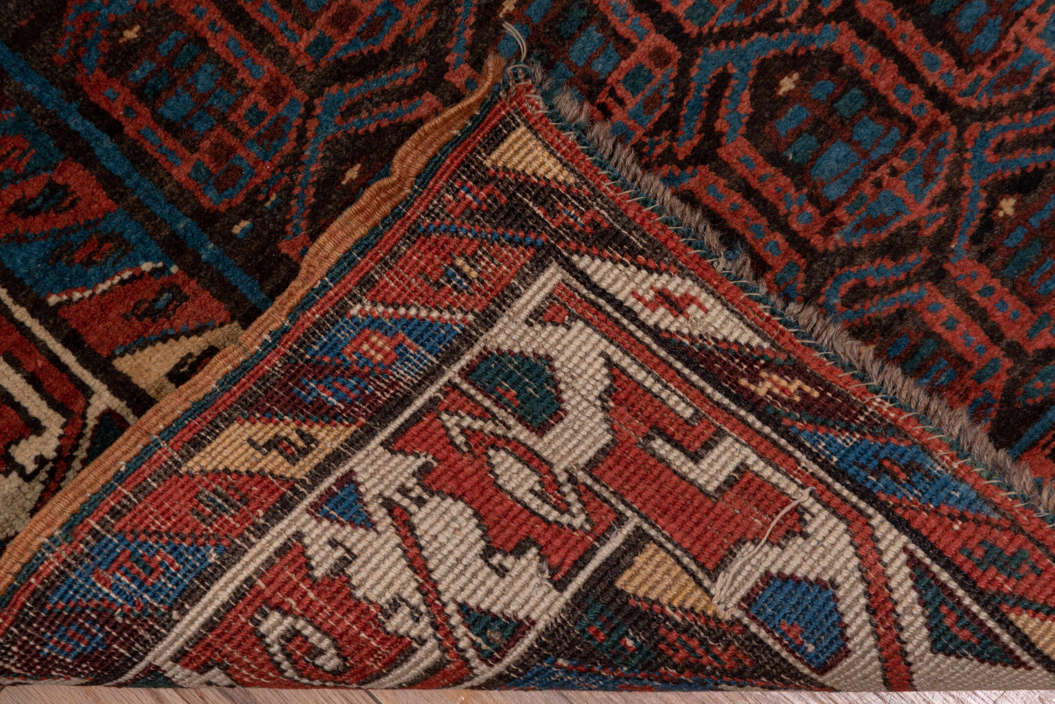 3' x 15' one-of-a-kind handmade vintage Sarab runner rug. Color palette: black, blue, brown, charcoal, gray, off-white, red