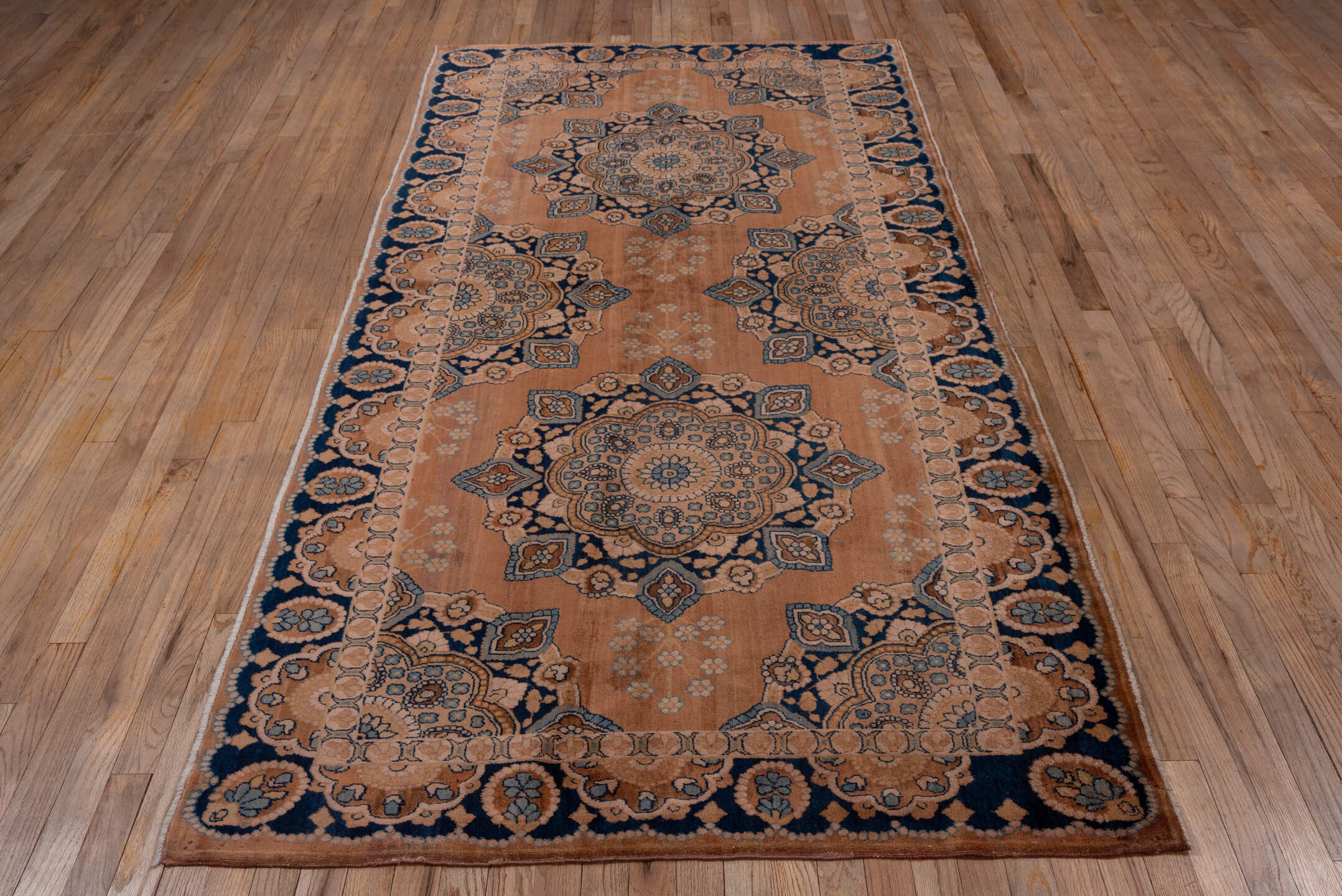 4' x 9' one-of-a-kind handmade antique Kerman runner rug. Color palette: rose, navy, taupe, ivory, slate, camel, pink, red
