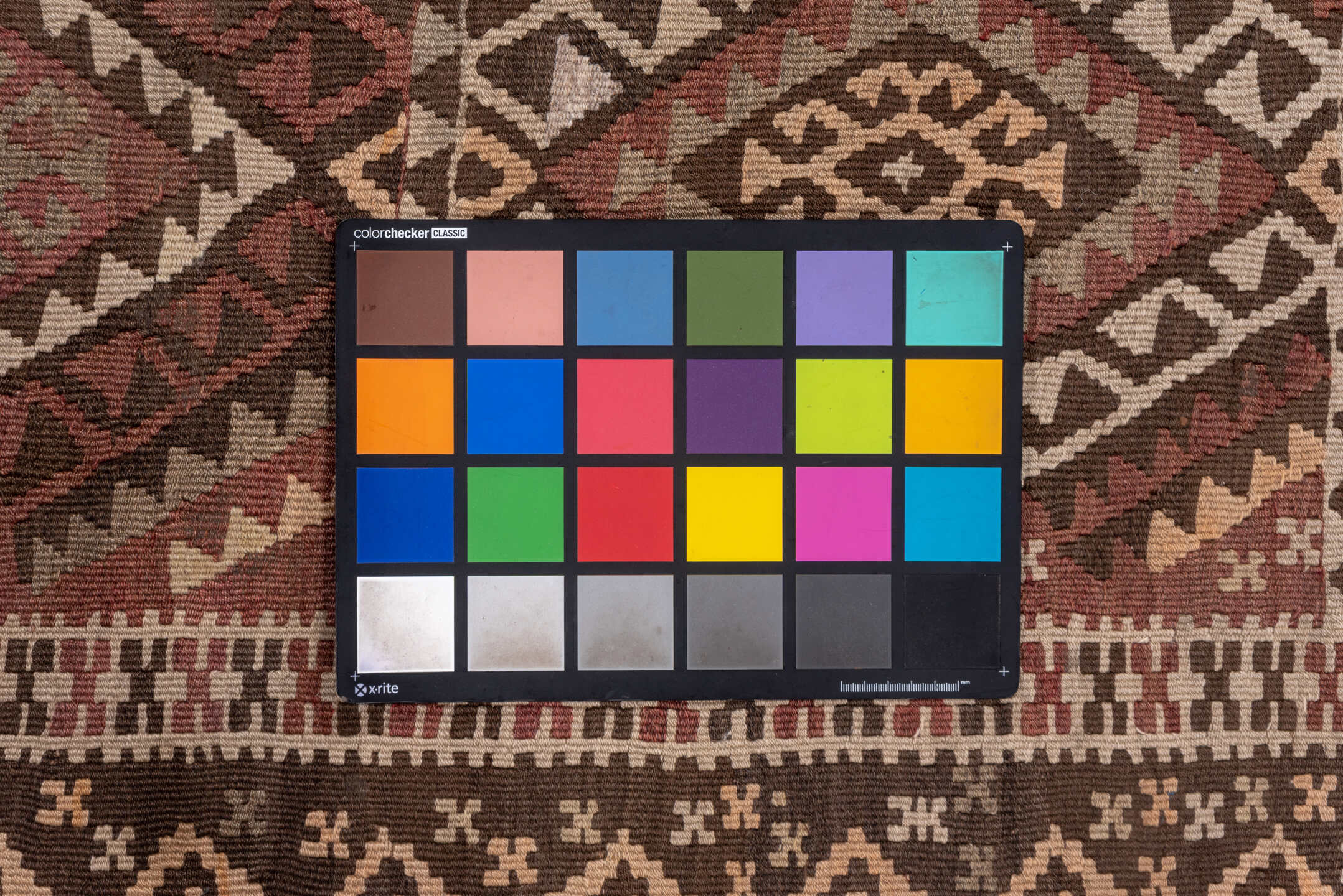 4' x 11' one-of-a-kind handmade vintage Kilim runner rug. Color palette: rose, rust, brown, ivory, taupe, mauve, pink, red