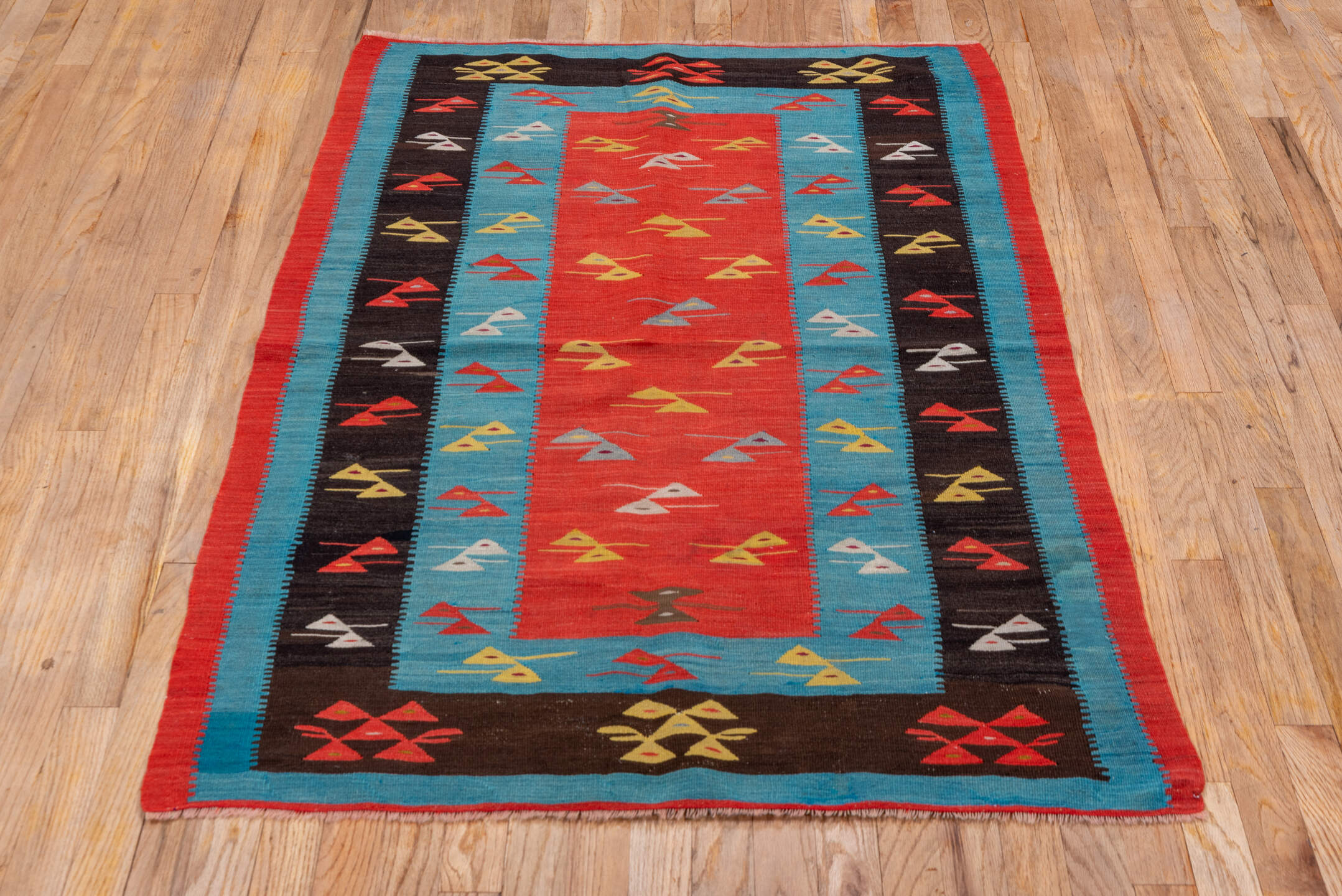 3' x 5' one-of-a-kind handmade antique Kilim small size rug. Color palette: coral, sky_blue, espresso, red, ivory