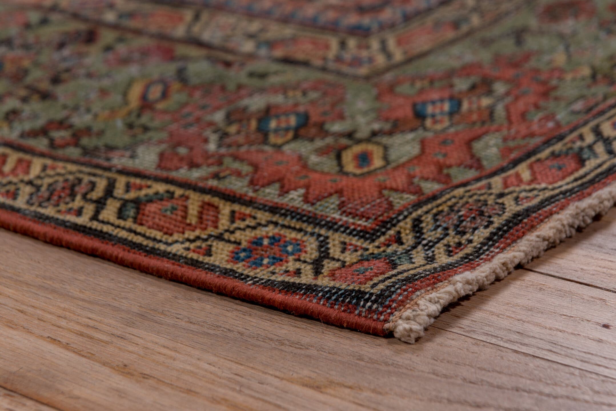 5' x 9' one-of-a-kind handmade antique Farahan medium size rug. Color palette: navy, olive, rust, ivory, terra cotta, sage