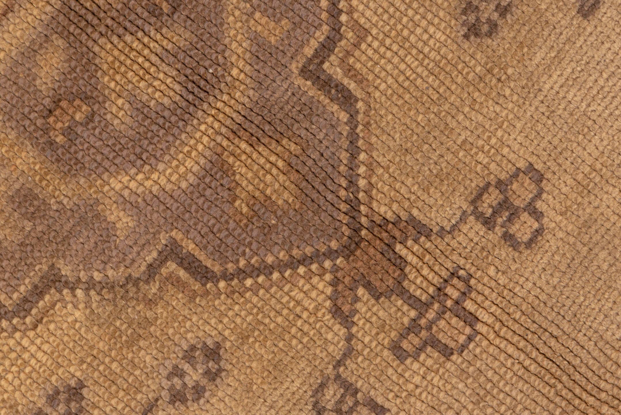 7' x 9' one-of-a-kind handmade antique Oushak rug. Color palette: beige, taupe, camel, brown, ivory, sand, mauve, gray, pink