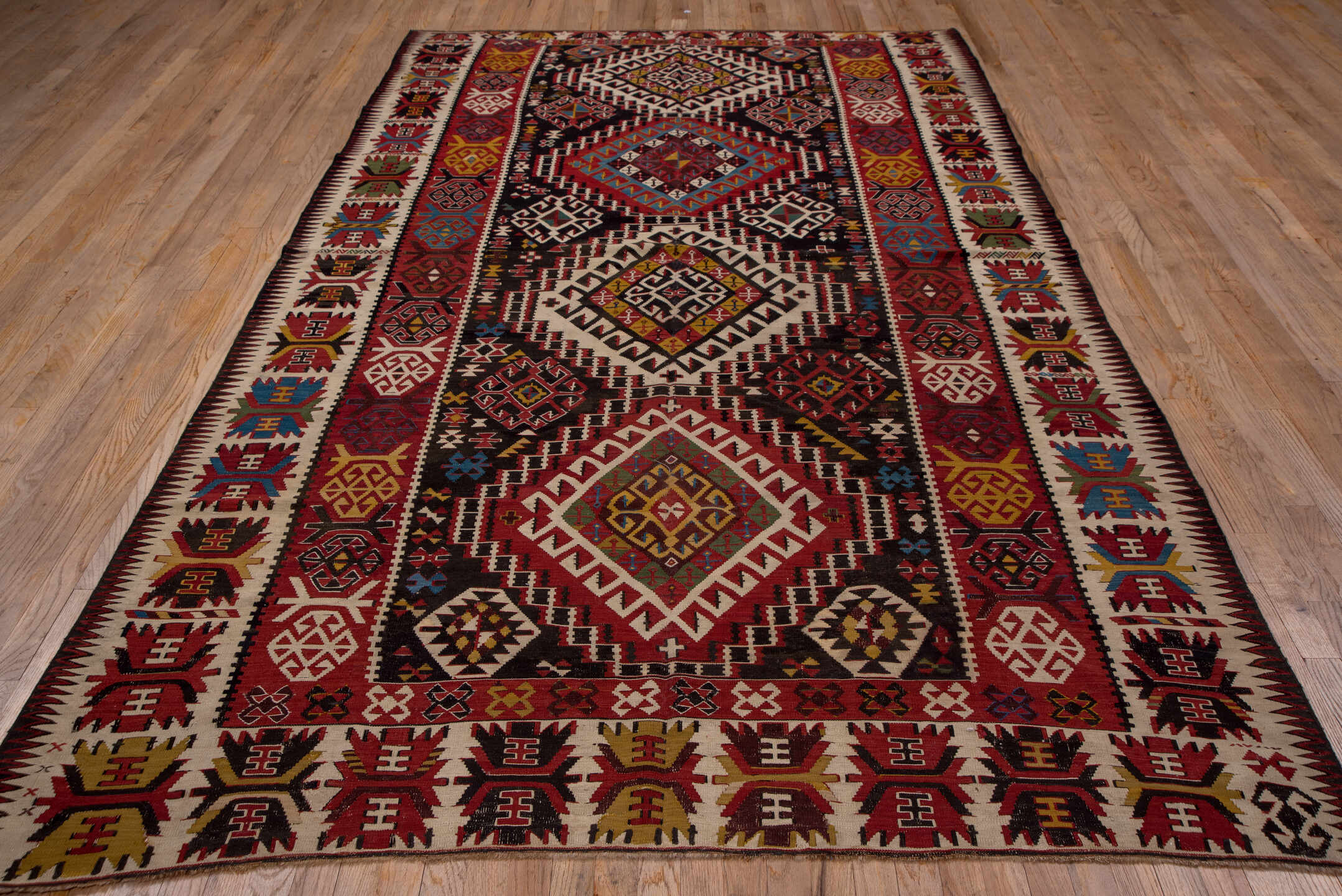 6' x 10' one-of-a-kind handmade vintage Kilim large size rug. Color palette: burgundy, ivory, rust, gold, navy, blue, olive