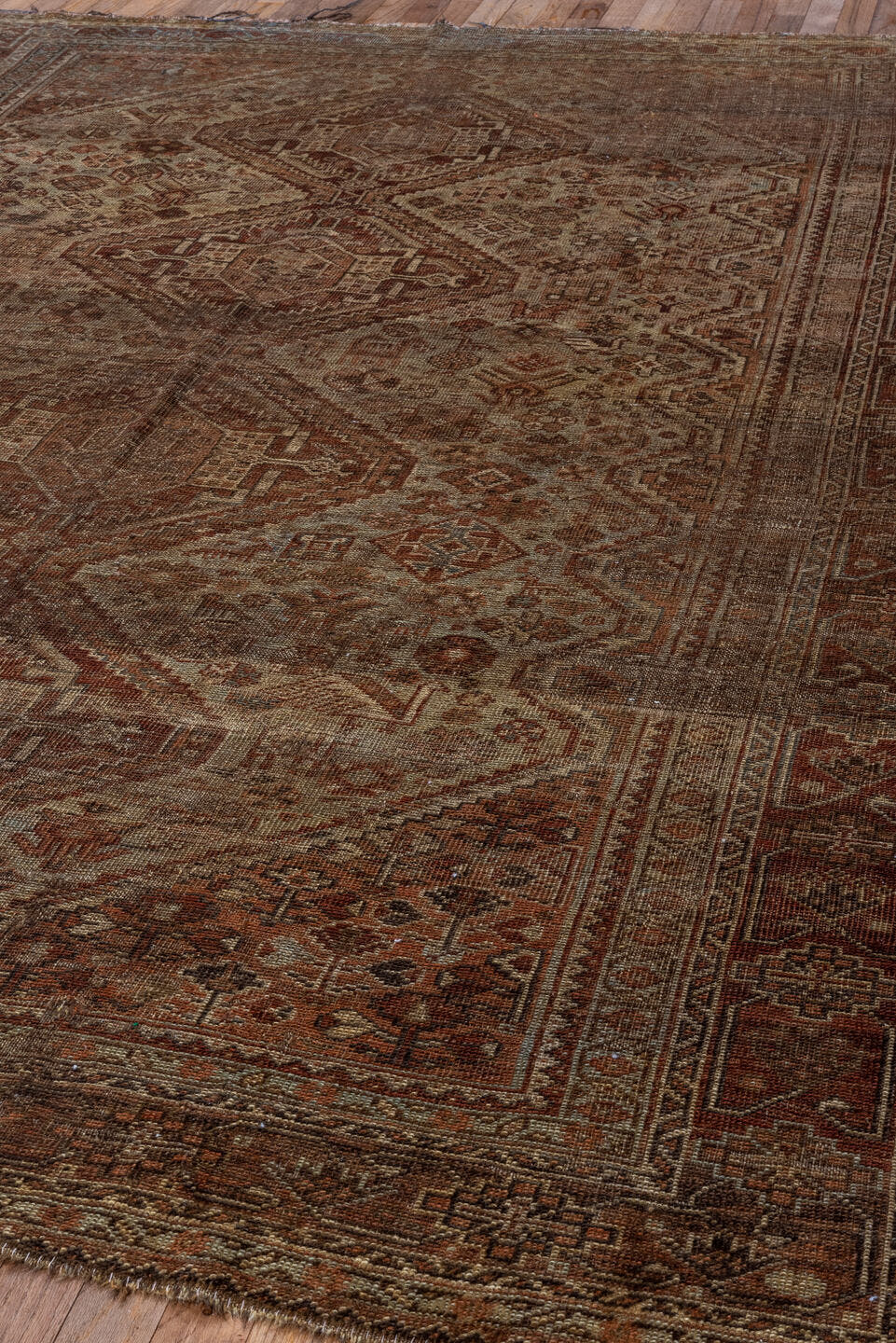 6' x 9' one-of-a-kind handmade antique Shiraz large size rug. Color palette: brown, rust, camel, ivory, taupe, mahogany