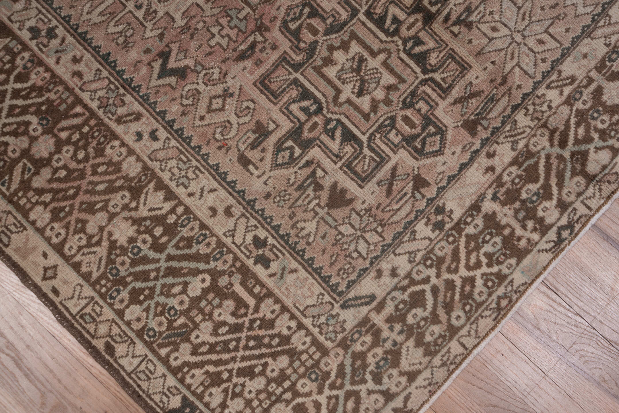 7' x 10' one-of-a-kind handmade antique Karaje large size rug. Color palette: taupe, rose, brown, ivory, charcoal, slate