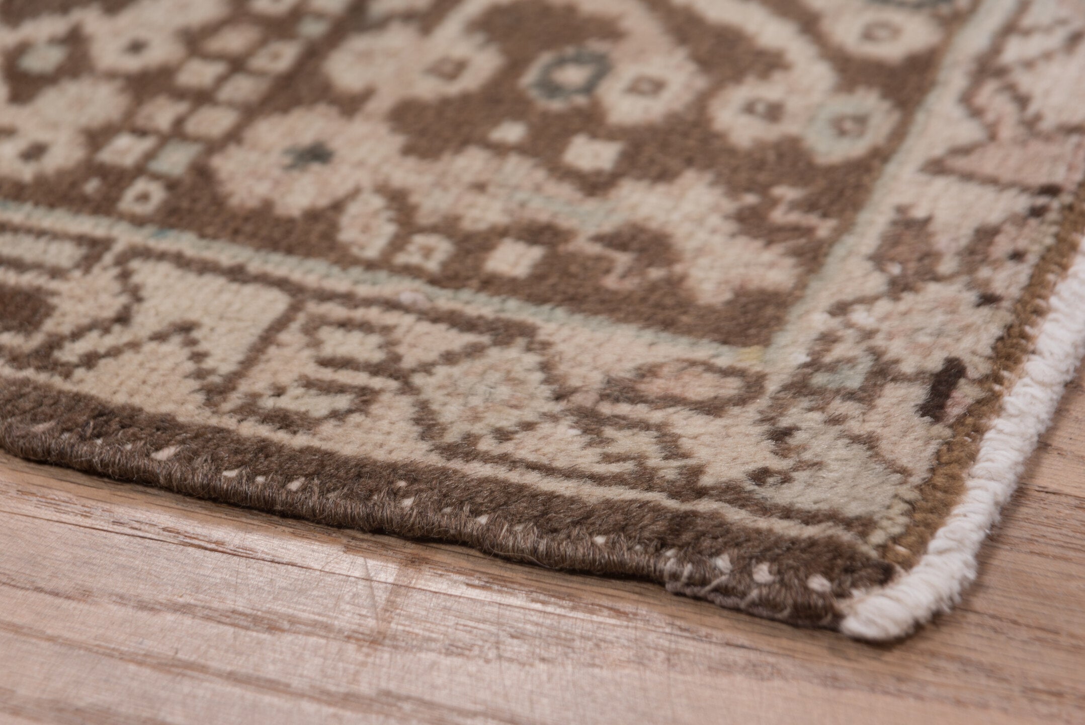 7' x 10' one-of-a-kind handmade vintage Karaje large size rug. Color palette: brown, gray, light gray, off-white, pink, snow