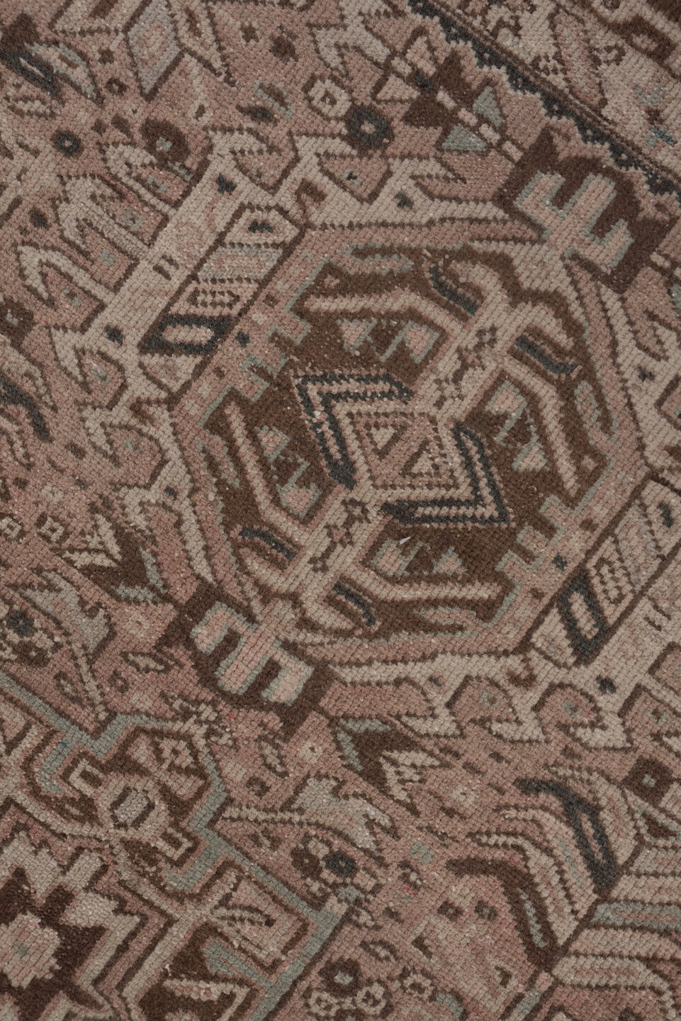 7' x 10' one-of-a-kind handmade vintage Karaje large size rug. Color palette: brown, gray, light gray, off-white, pink, snow