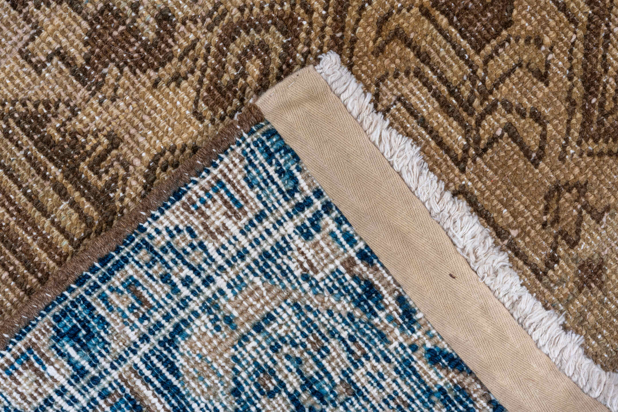 7' x 9' one-of-a-kind handmade antique Heriz rug. Color palette: taupe, camel, brown, ivory, charcoal, sage, slate, beige