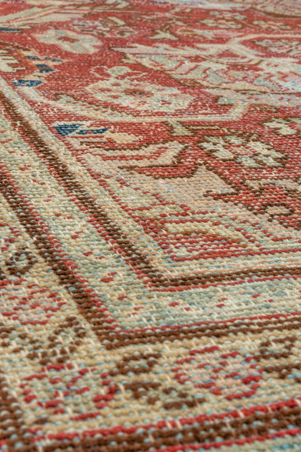 5' x 7' one-of-a-kind handmade antique Mahal rug. Color palette: red, ivory, beige, light blue, rust, taupe, brown