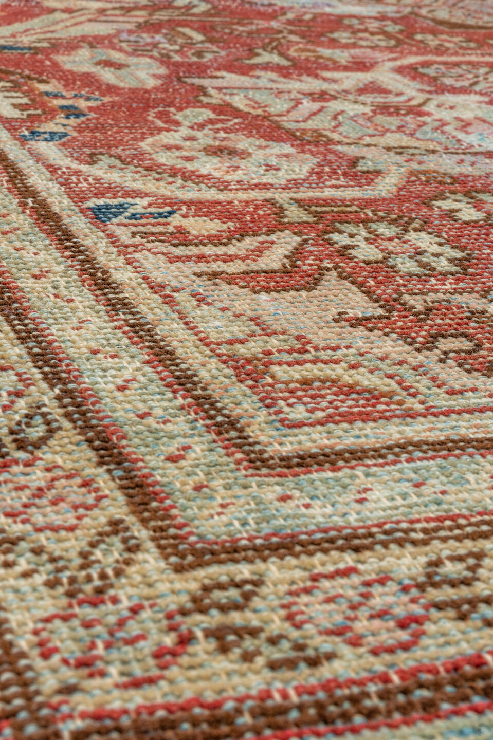 5' x 7' one-of-a-kind handmade antique Mahal rug. Color palette: red, ivory, beige, light blue, rust, taupe, brown