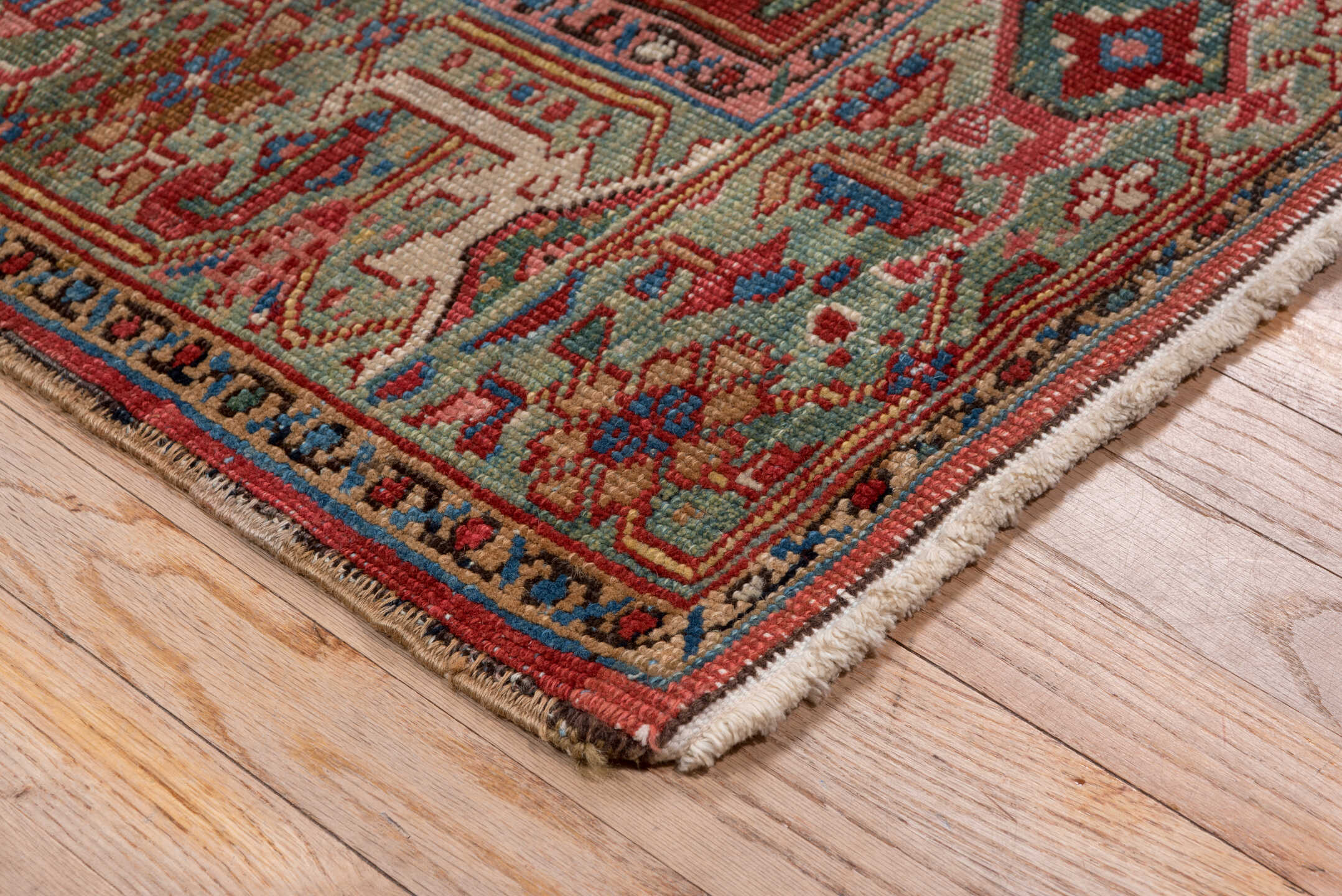 6' x 8' one-of-a-kind handmade antique Heriz medium size rug. Color palette: rust, sage, ivory, navy, rose, taupe, slate