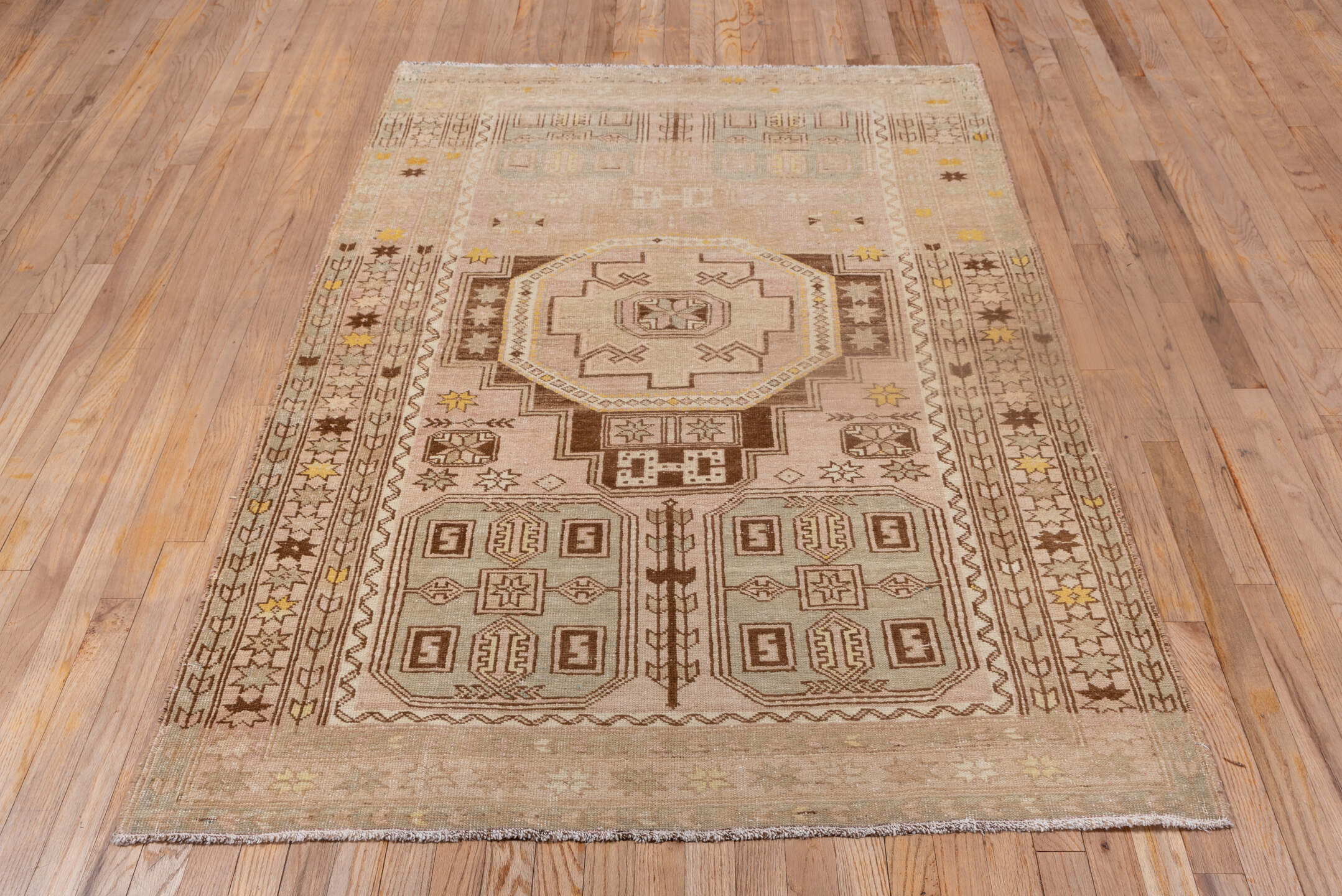 4' x 6' one-of-a-kind handmade antique Trans Caucasian small size rug. Color palette: ivory, taupe, brown, gold, beige, gray