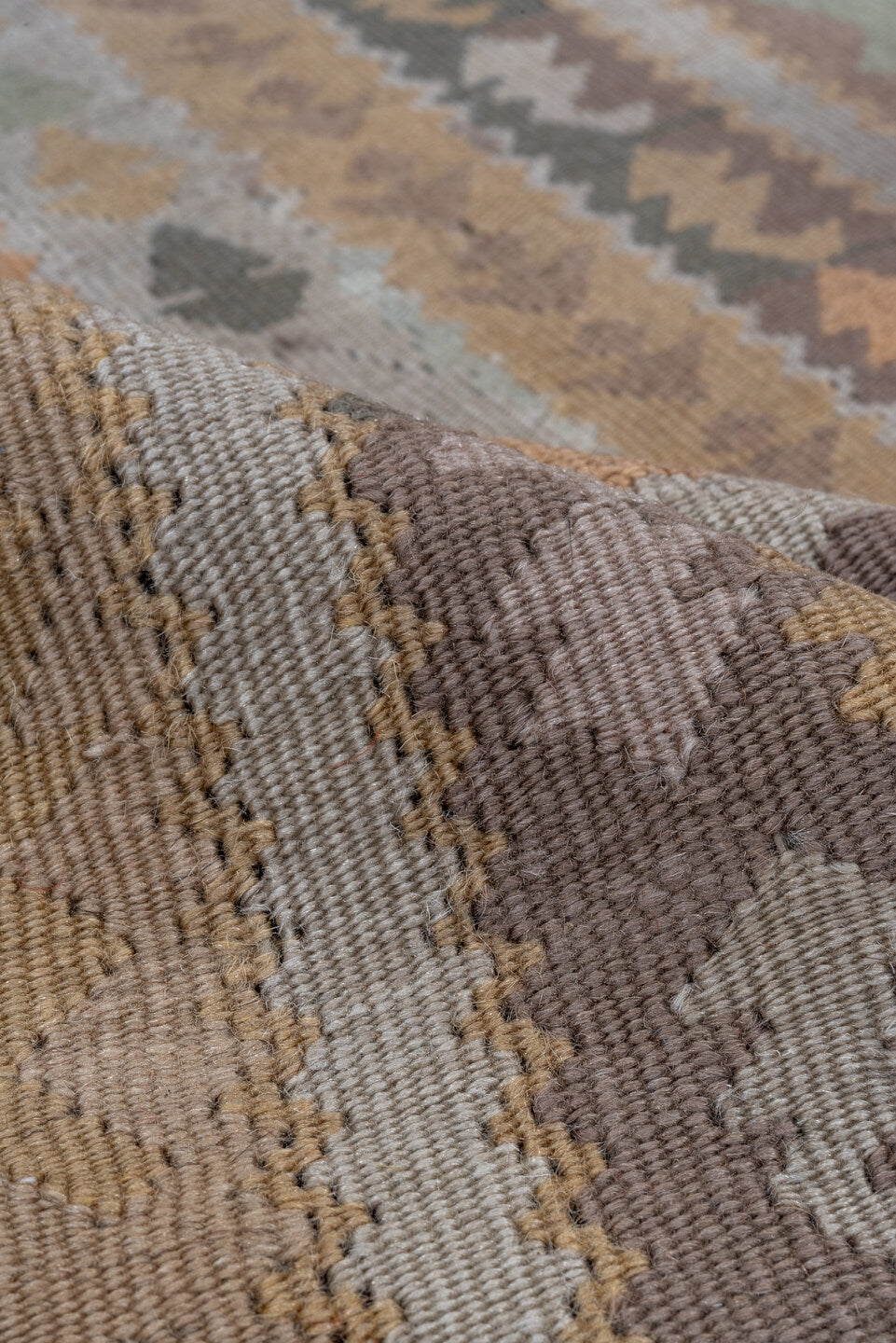 3' x 5' one-of-a-kind handmade antique Belouch small size rug. Color palette: taupe, camel, ivory, sage, terra cotta