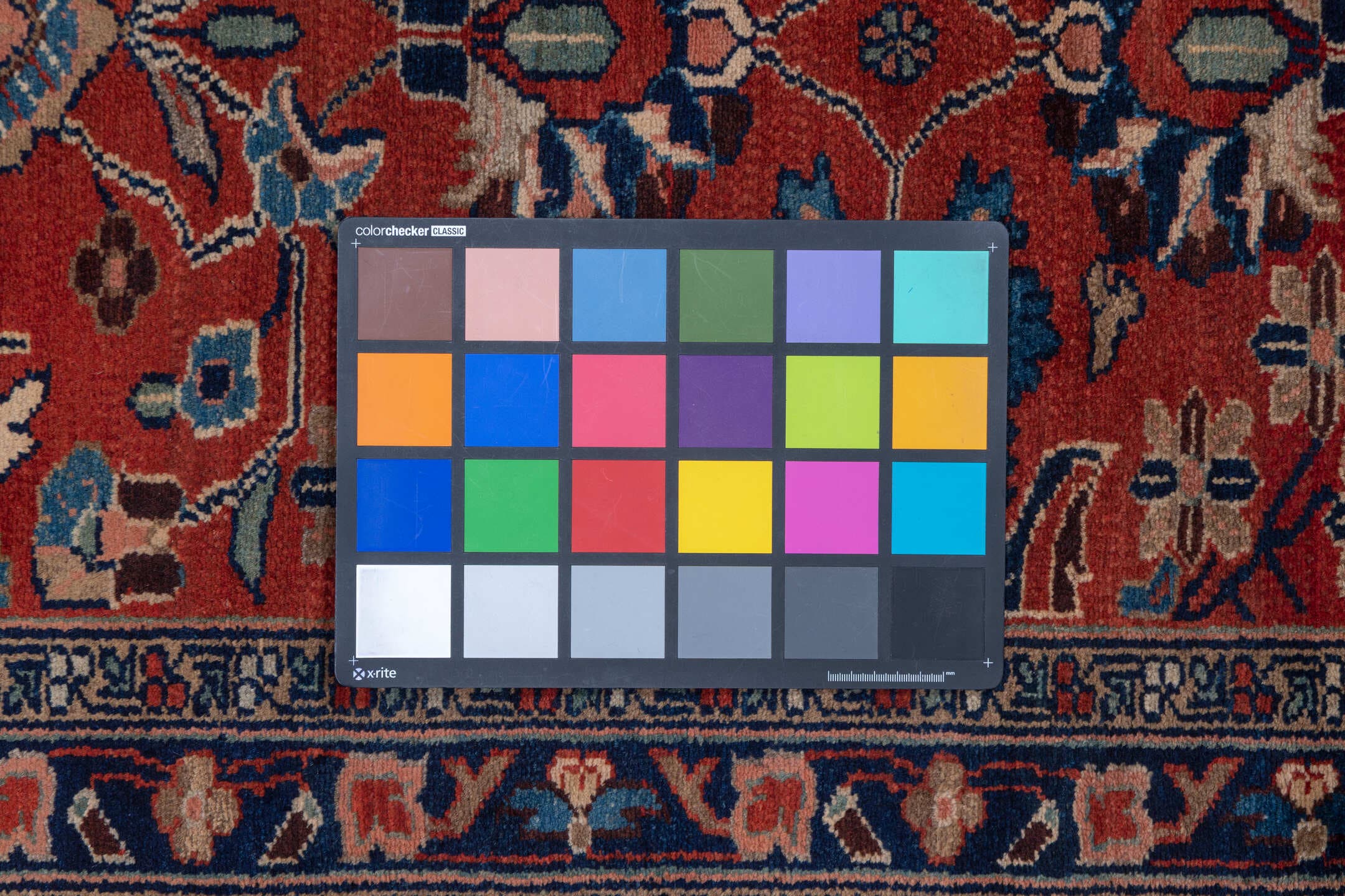 2' x 19' one-of-a-kind handmade antique Lilian runner rug. Color palette: rust, navy, ivory, camel, slate, terracotta, brown