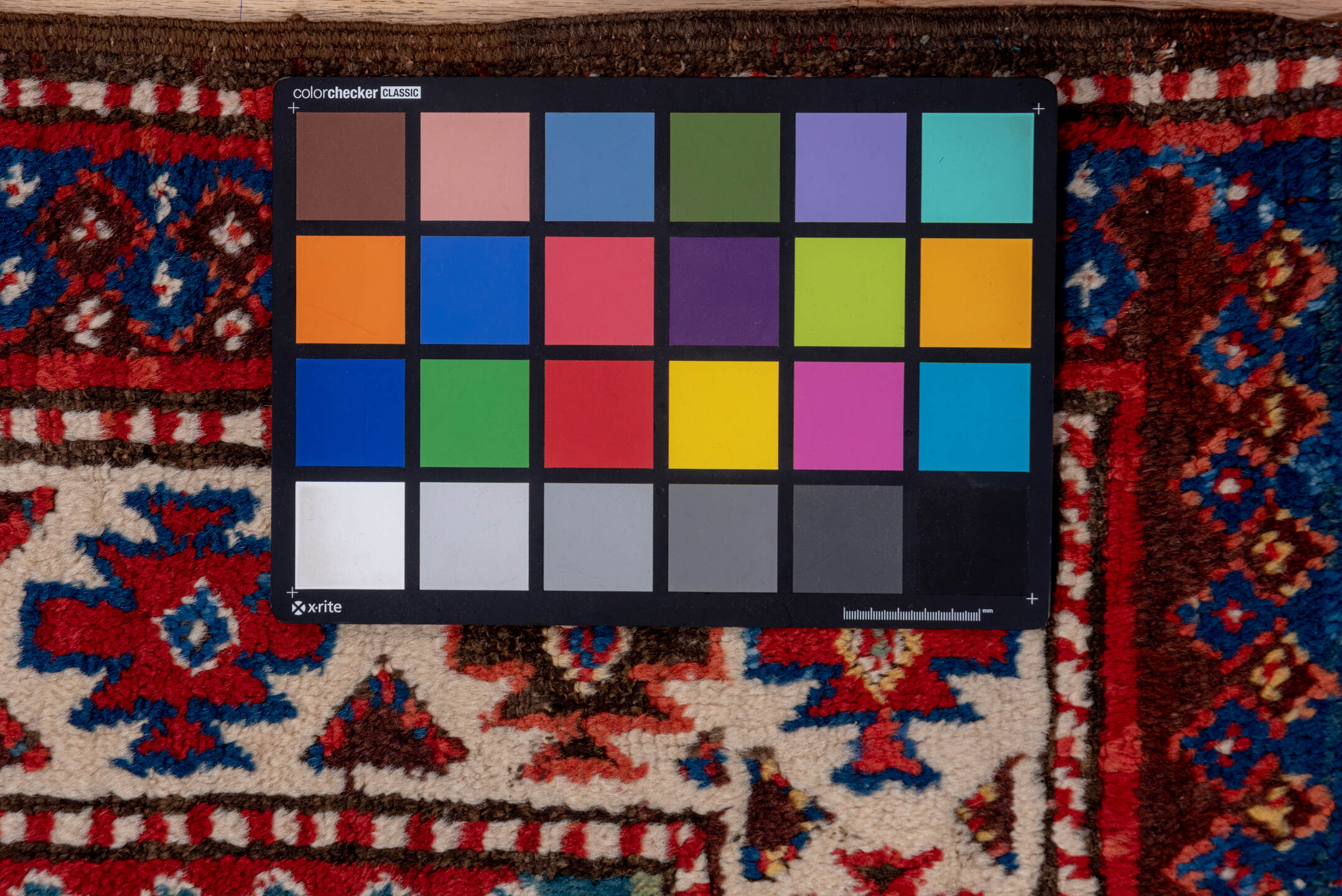 3' x 8' one-of-a-kind handmade vintage Kazak runner rug. Color palette: arapawa, blue, brown, fiord, gray, pink, red