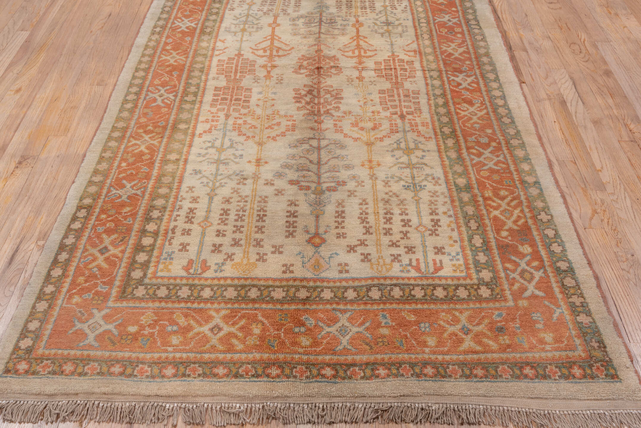 4' x 9' one-of-a-kind handmade vintage Sultanabad rug. Color palette: brown, gray, light gray, off-white, orange, pink