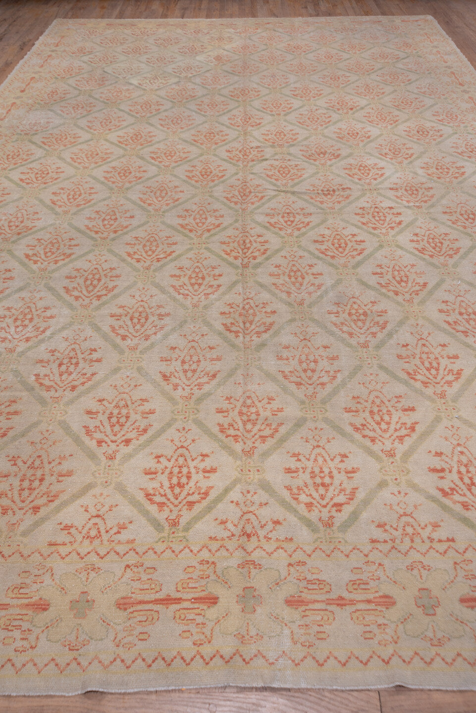 10' x 17' one-of-a-kind handmade vintage Spanish rug. Color palette: brown, gray, light gray, off-white, orange, pink