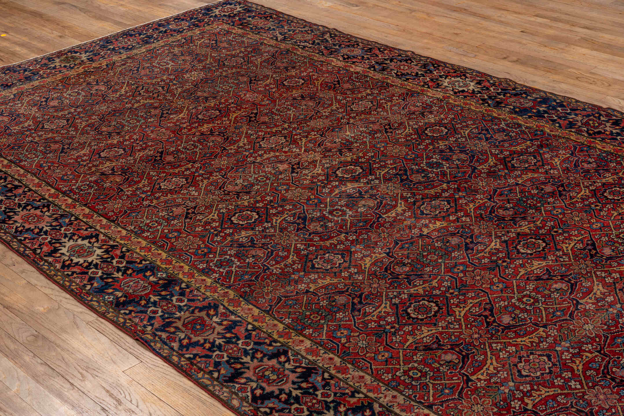 7' x 14' one-of-a-kind handmade antique Farahan large size rug. Color palette: rust, navy, ivory, crimson, camel, indigo