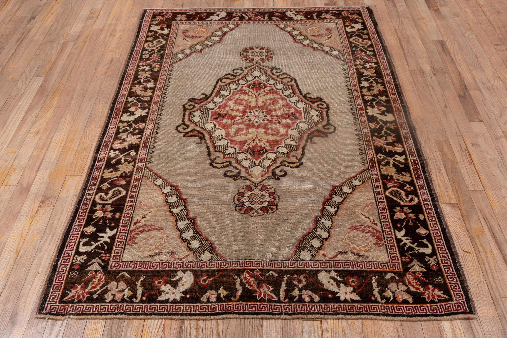 4' x 6' one-of-a-kind handmade vintage Oushak small size rug. Color palette: brown, gray, light gray, off-white, orange