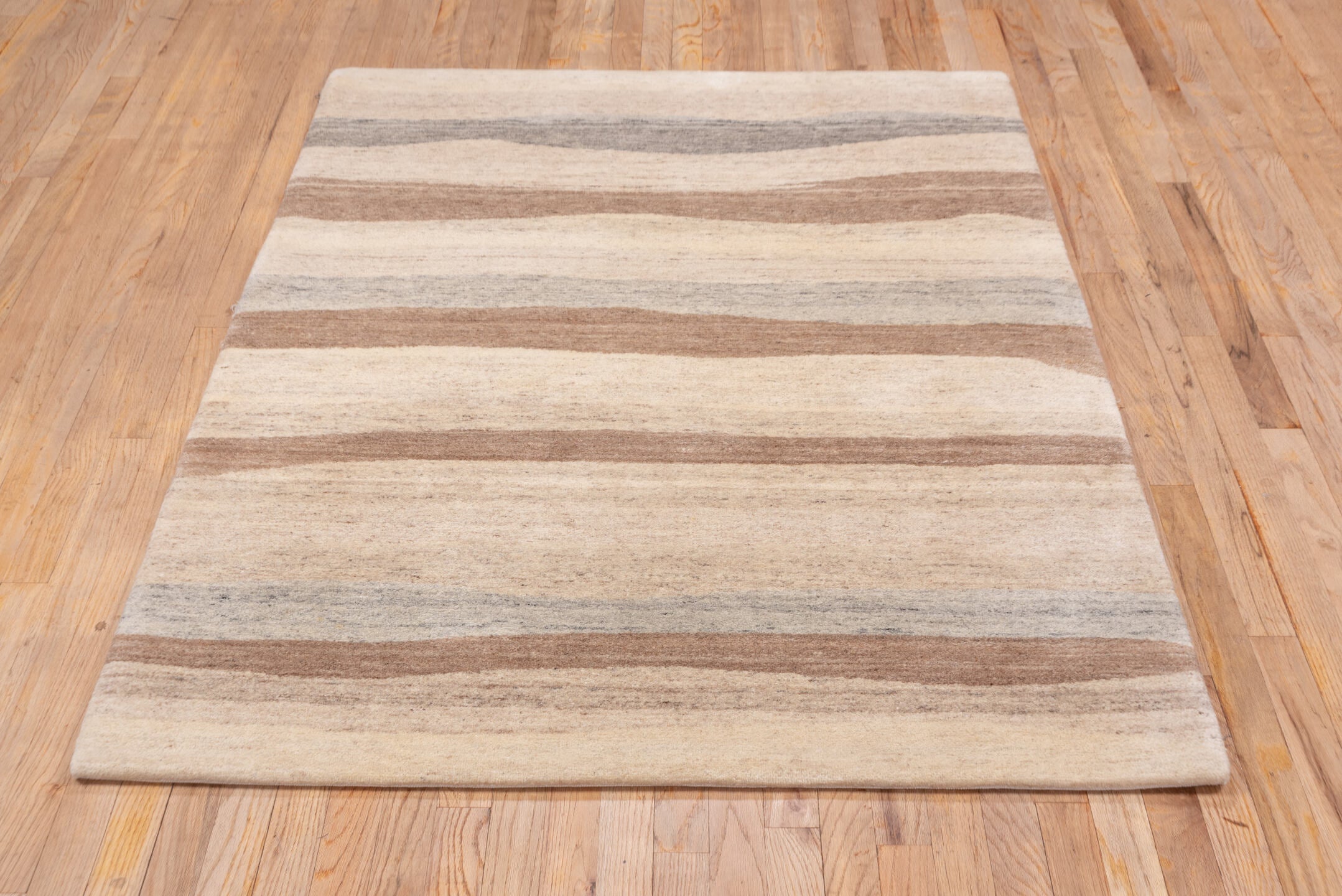 4' x 6' one-of-a-kind handmade vintage Ocean small size rug. Color palette: ivory, taupe, camel, gray, beige