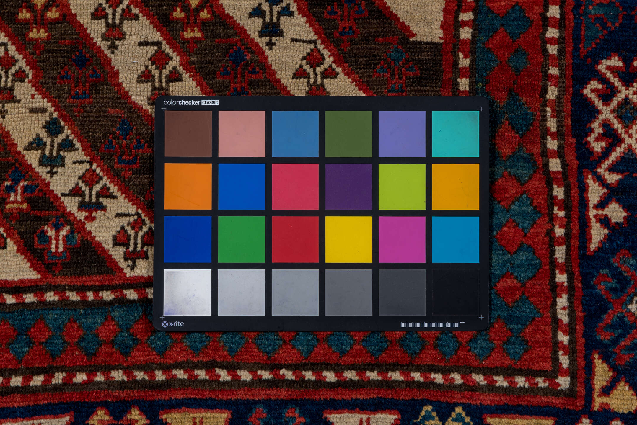 3' x 7' one-of-a-kind handmade vintage Kazak rug. Color palette: arapawa, black, blue, brown, charcoal, gray, pink, red