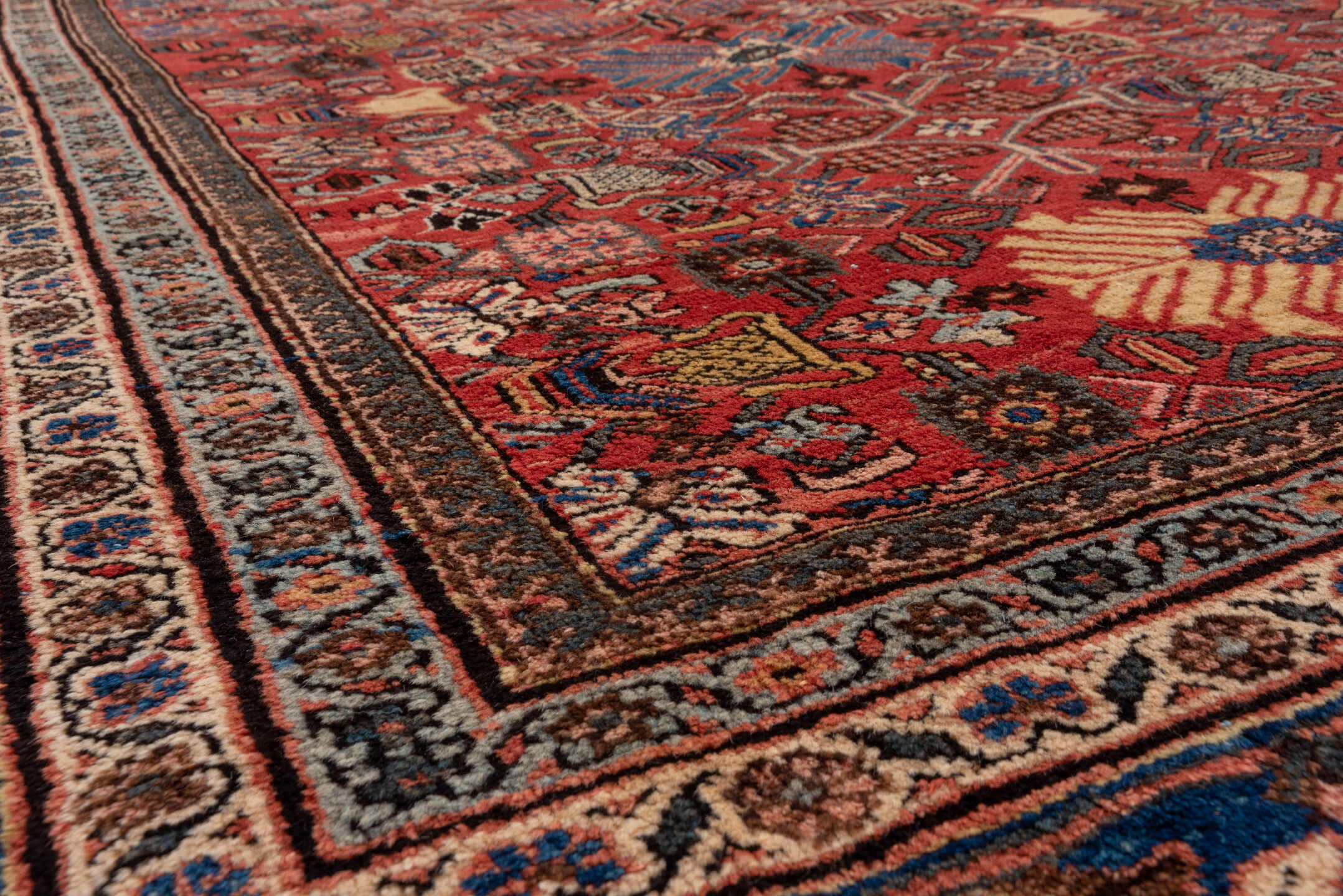 11' x 19' one-of-a-kind handmade vintage Mahal oversize rug. Color palette: red, navy, ivory, slate, rose, camel, charcoal