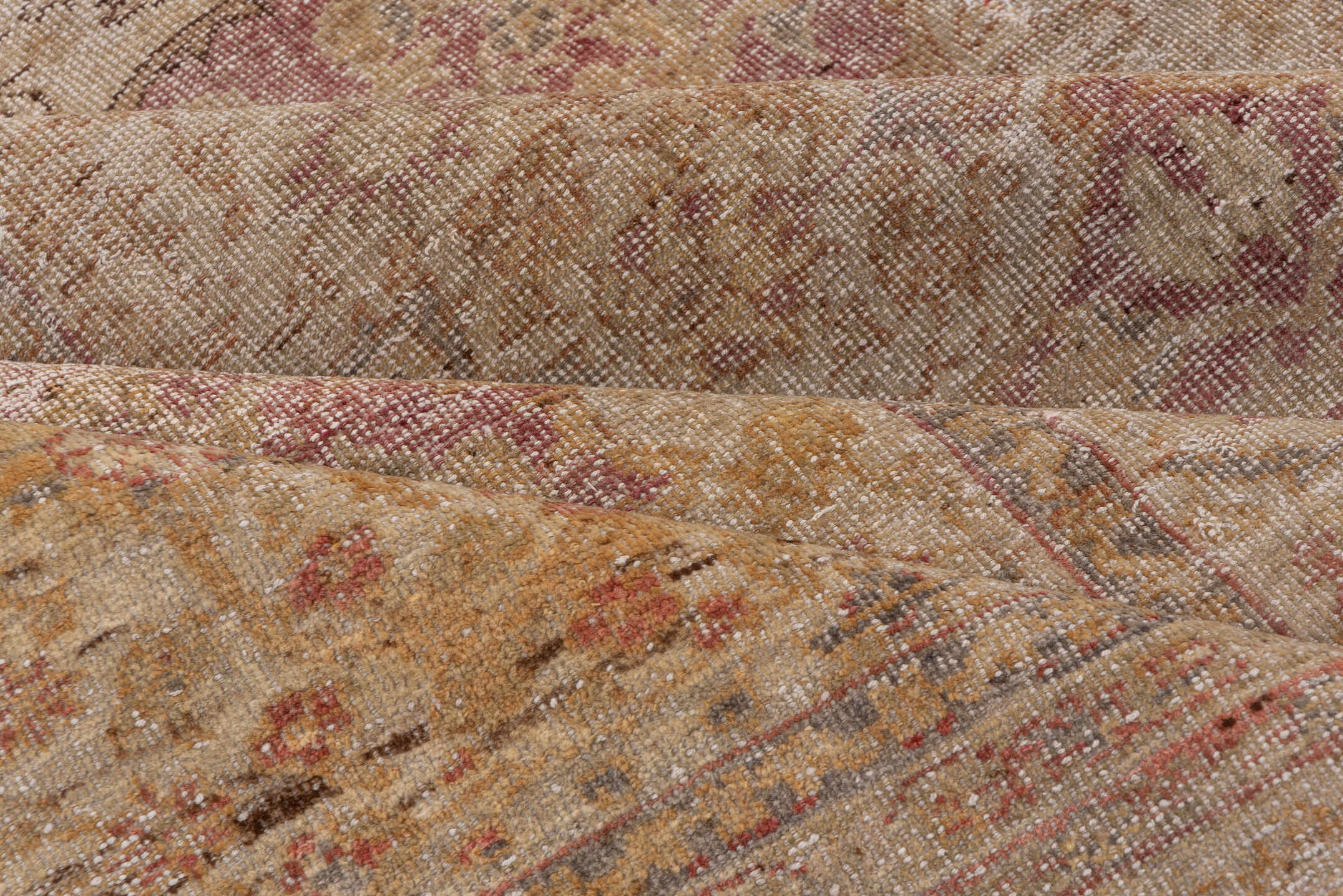5' x 8' one-of-a-kind handmade vintage Sivas medium size rug. Color palette: tan, taupe, rose, gold, beige, dusty pink