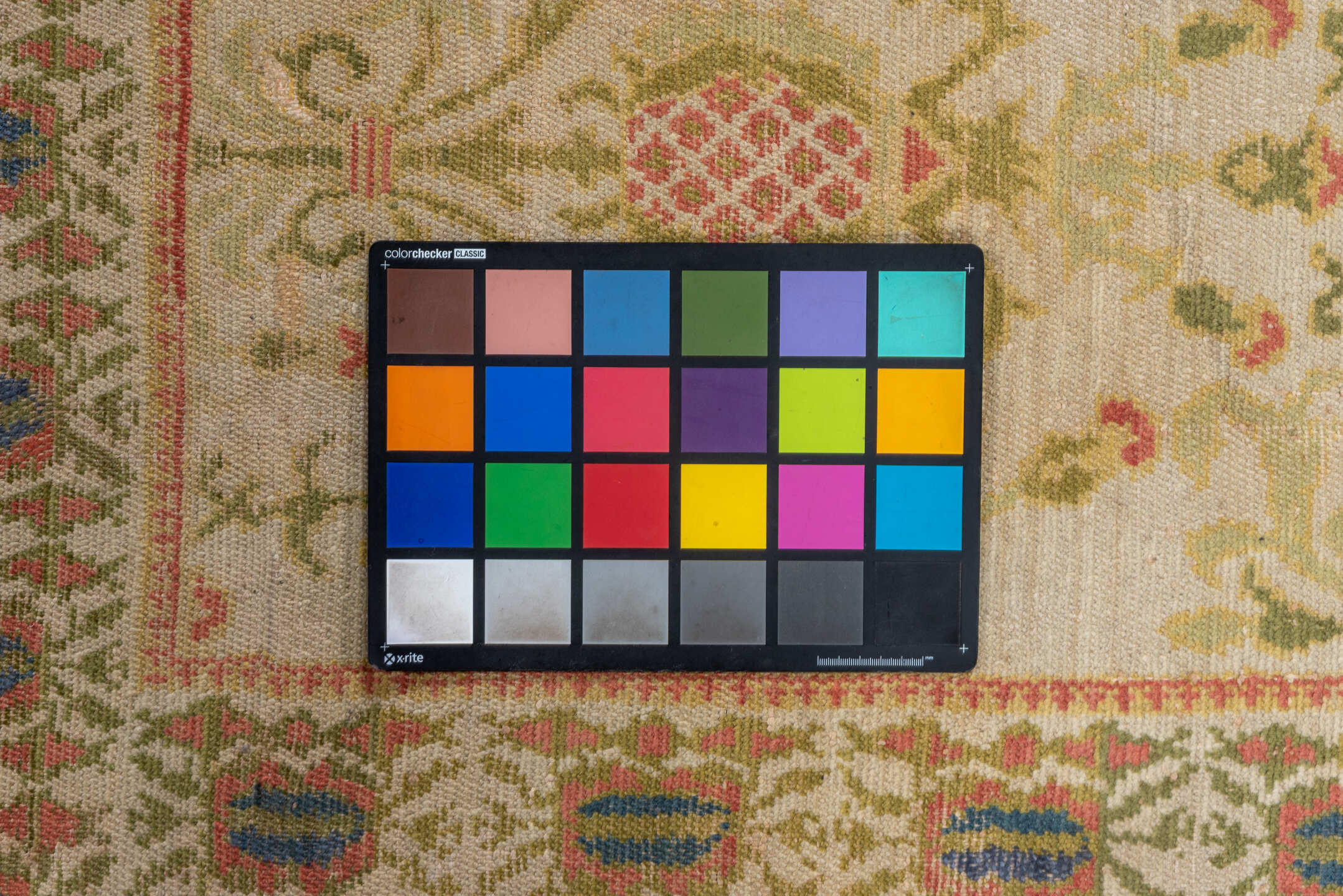 5' x 7' one-of-a-kind handmade vintage Spanish rug. Color palette: brown, gray, navajo white, off-white, orange, peach puff