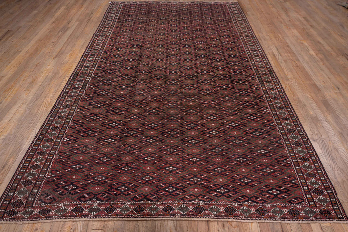 6' x 11' one-of-a-kind handmade vintage Kilim large size rug. Color palette: burgundy, brown, charcoal, ivory, rust, taupe