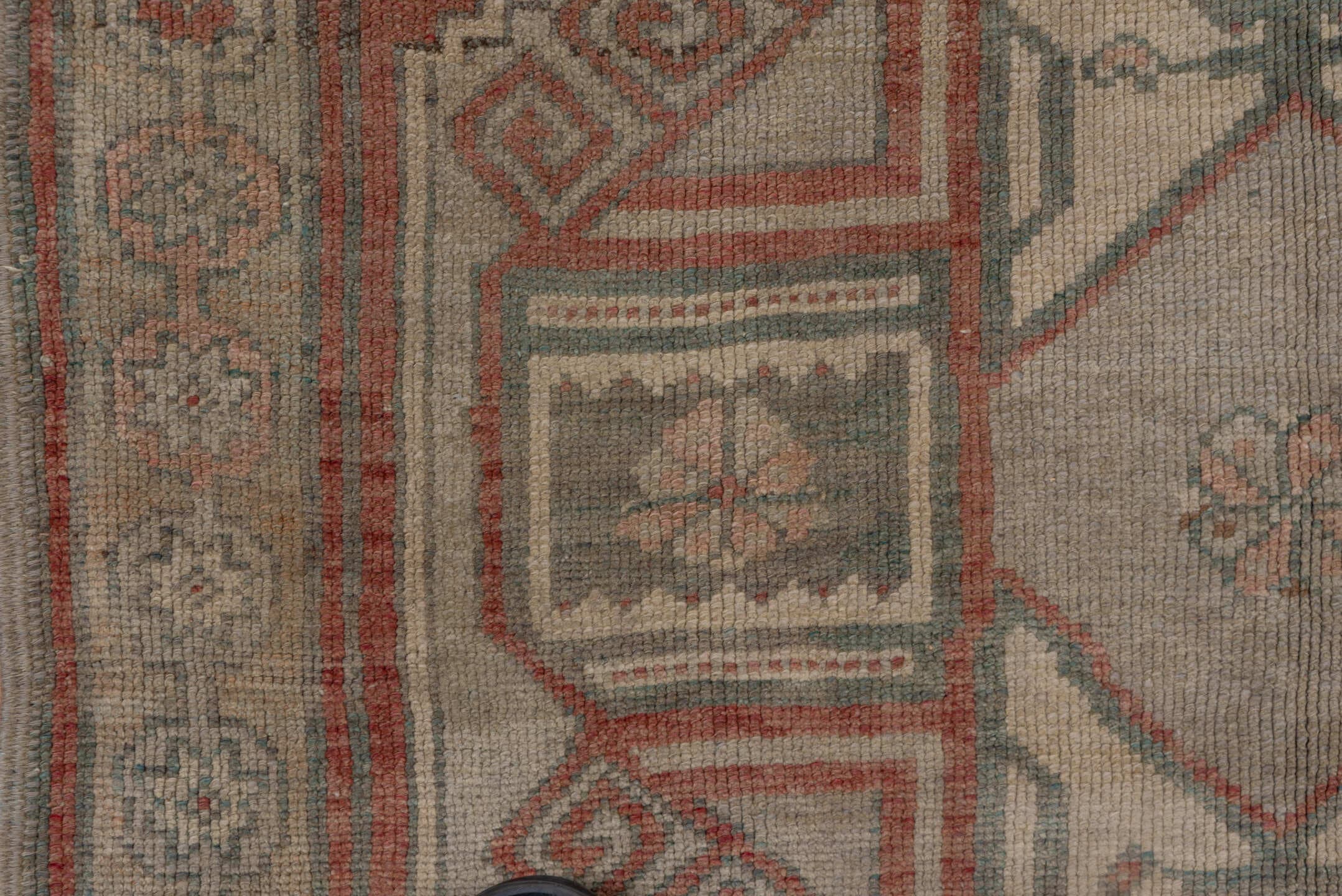 4' x 11' one-of-a-kind handmade vintage Oushak runner rug. Color palette: terra cotta, taupe, sage, ivory, rose, charcoal