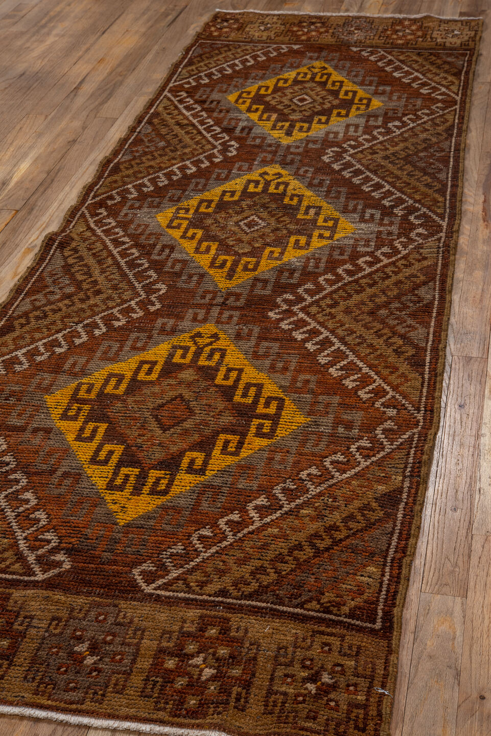2' x 8' one-of-a-kind handmade vintage Oushak runner rug. Color palette: brown, rust, gold, taupe, camel, ivory, ochre