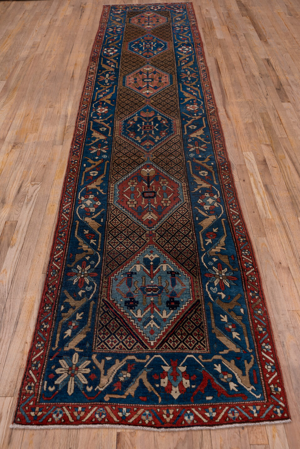 2' x 13' one-of-a-kind handmade vintage Sarab runner rug. Color palette: black, blue, brown, gray, off-white, pink, red