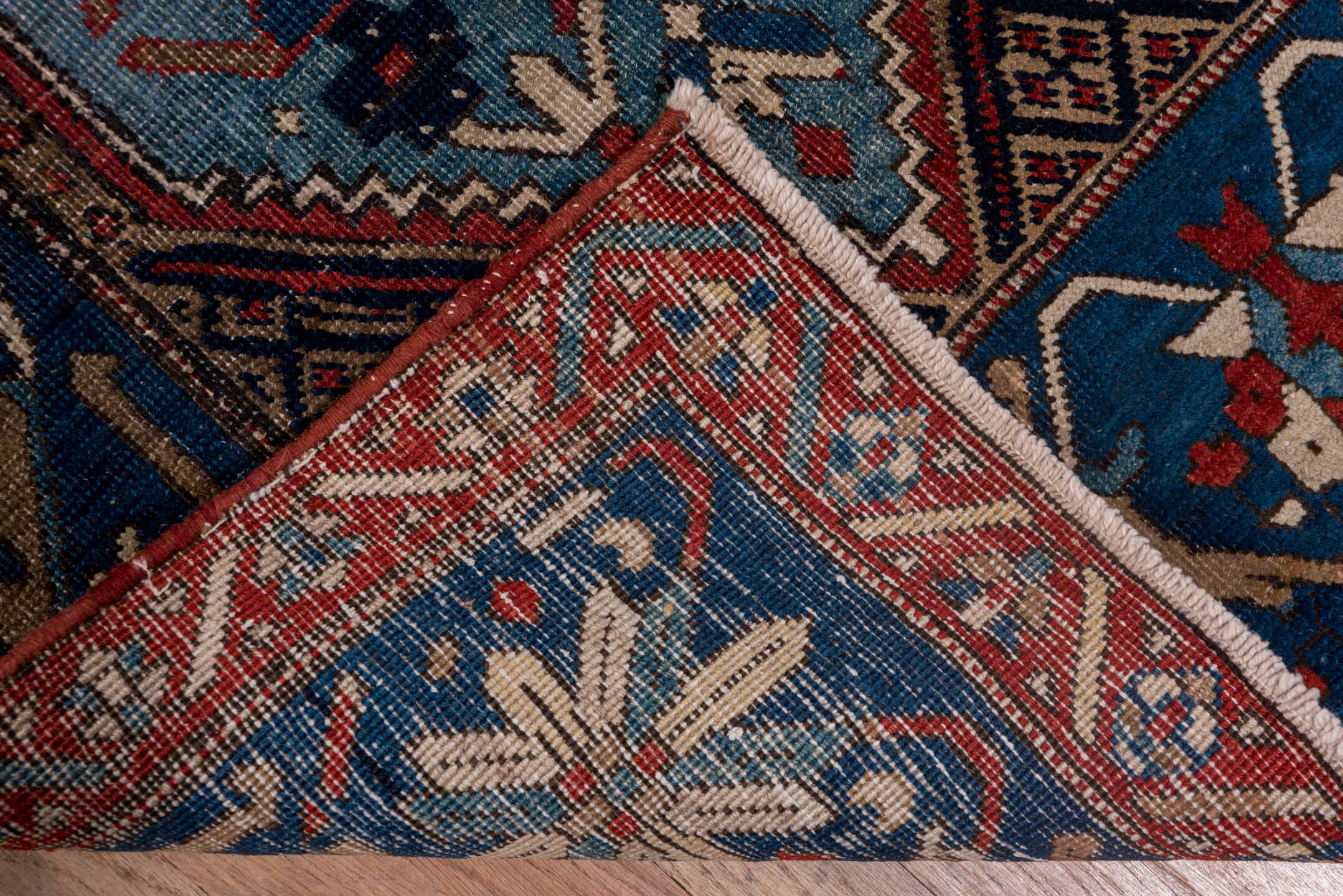 2' x 13' one-of-a-kind handmade antique Sarab runner rug. Color palette: navy, rust, camel, ivory, sky_blue, crimson