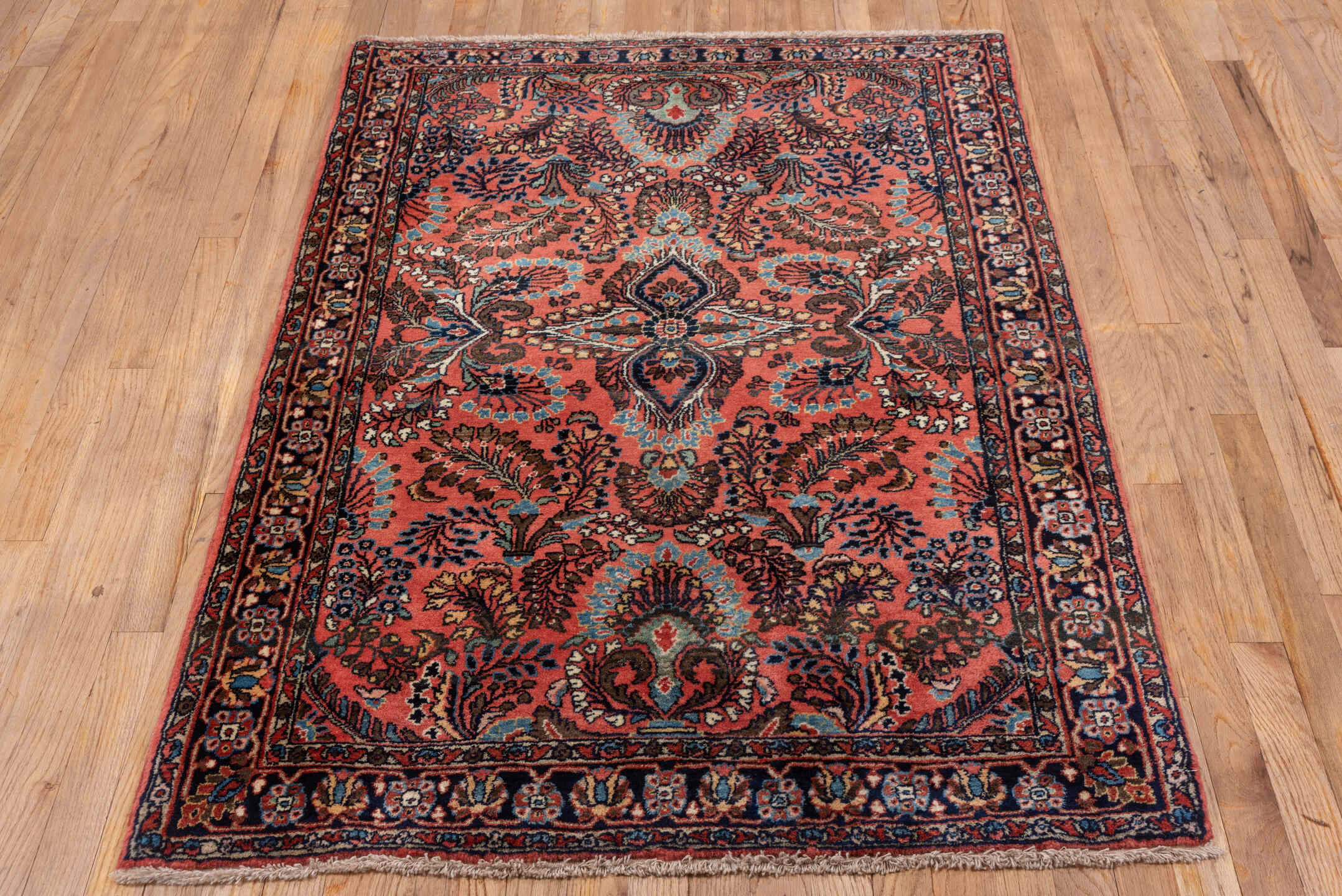 3' x 5' one-of-a-kind handmade antique Sarouk small size rug. Color palette: coral, navy, ivory, sky blue, burgundy, rose