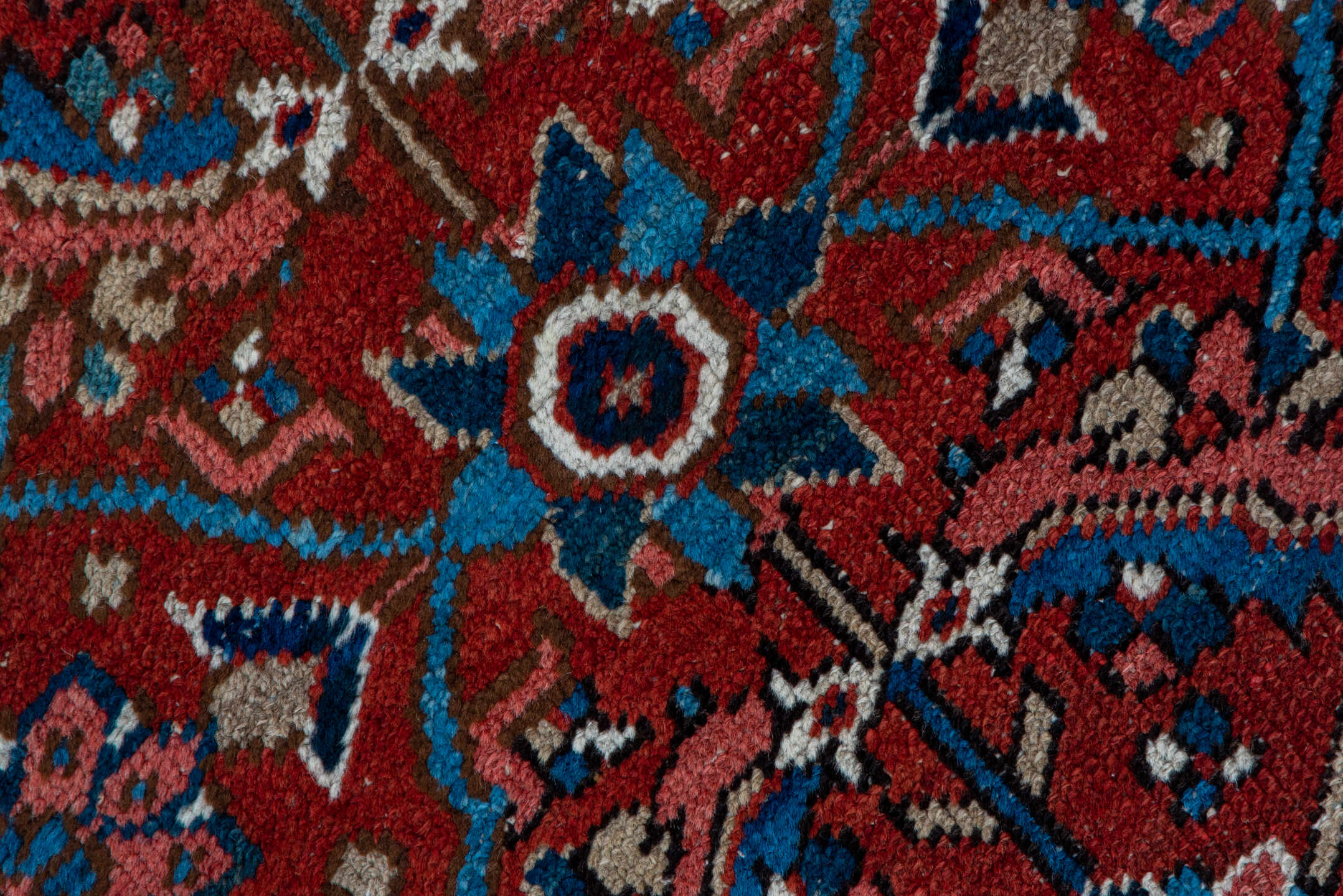 3' x 12' one-of-a-kind handmade vintage Heriz runner rug. Color palette: rust, navy, ivory, sky blue, rose, camel