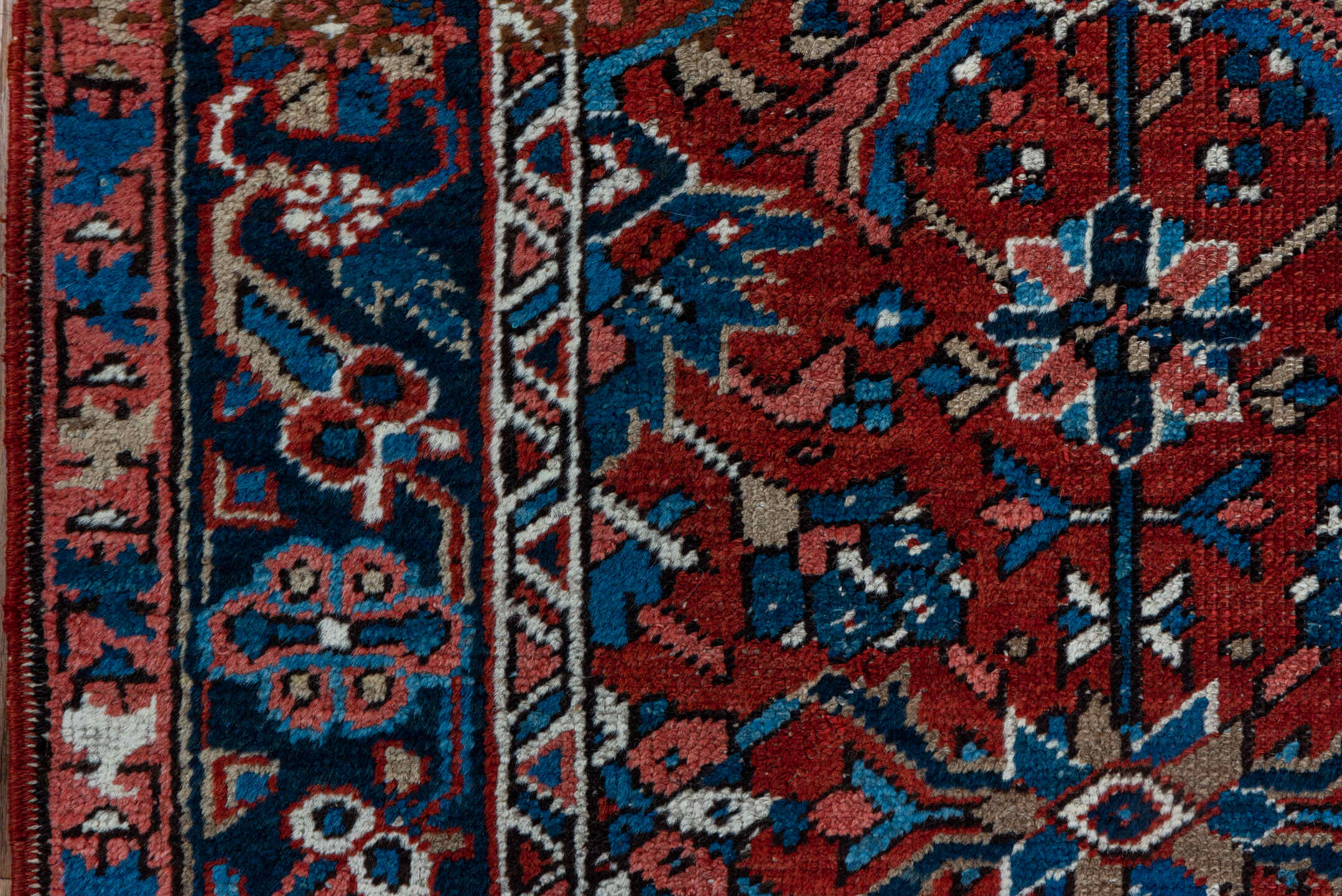 3' x 12' one-of-a-kind handmade vintage Heriz runner rug. Color palette: rust, navy, ivory, sky blue, rose, camel