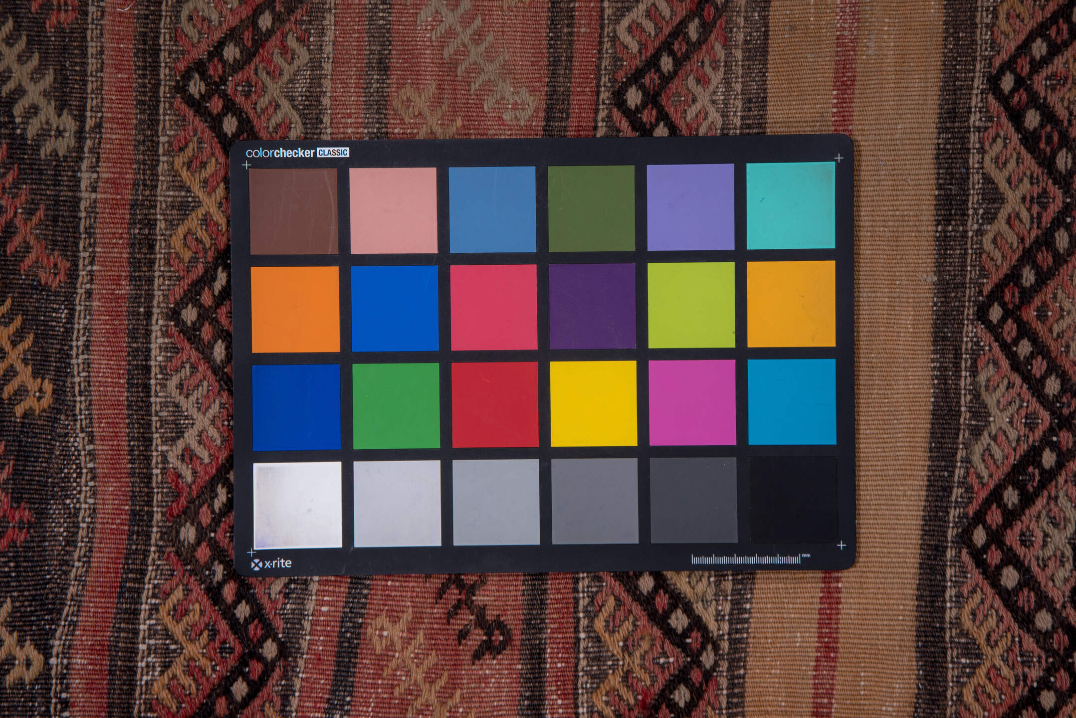 2' x 15' one-of-a-kind handmade vintage Jijim runner rug. Color palette: brown, gray, off-white, pink, red, redwood, snow