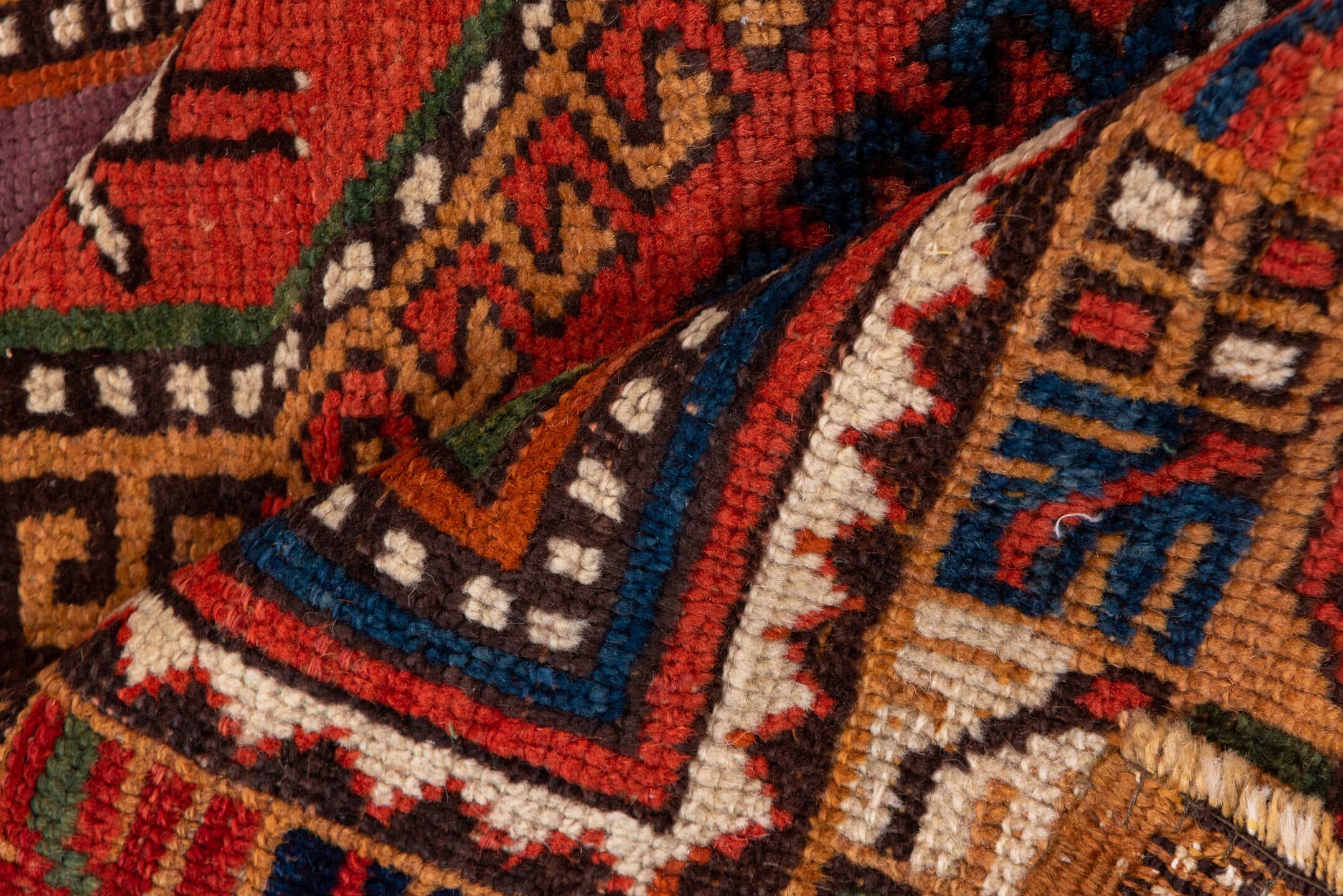 4' x 8' one-of-a-kind handmade antique Konya rug. Color palette: rust, terra cotta, sage, indigo, ivory, camel, burgundy