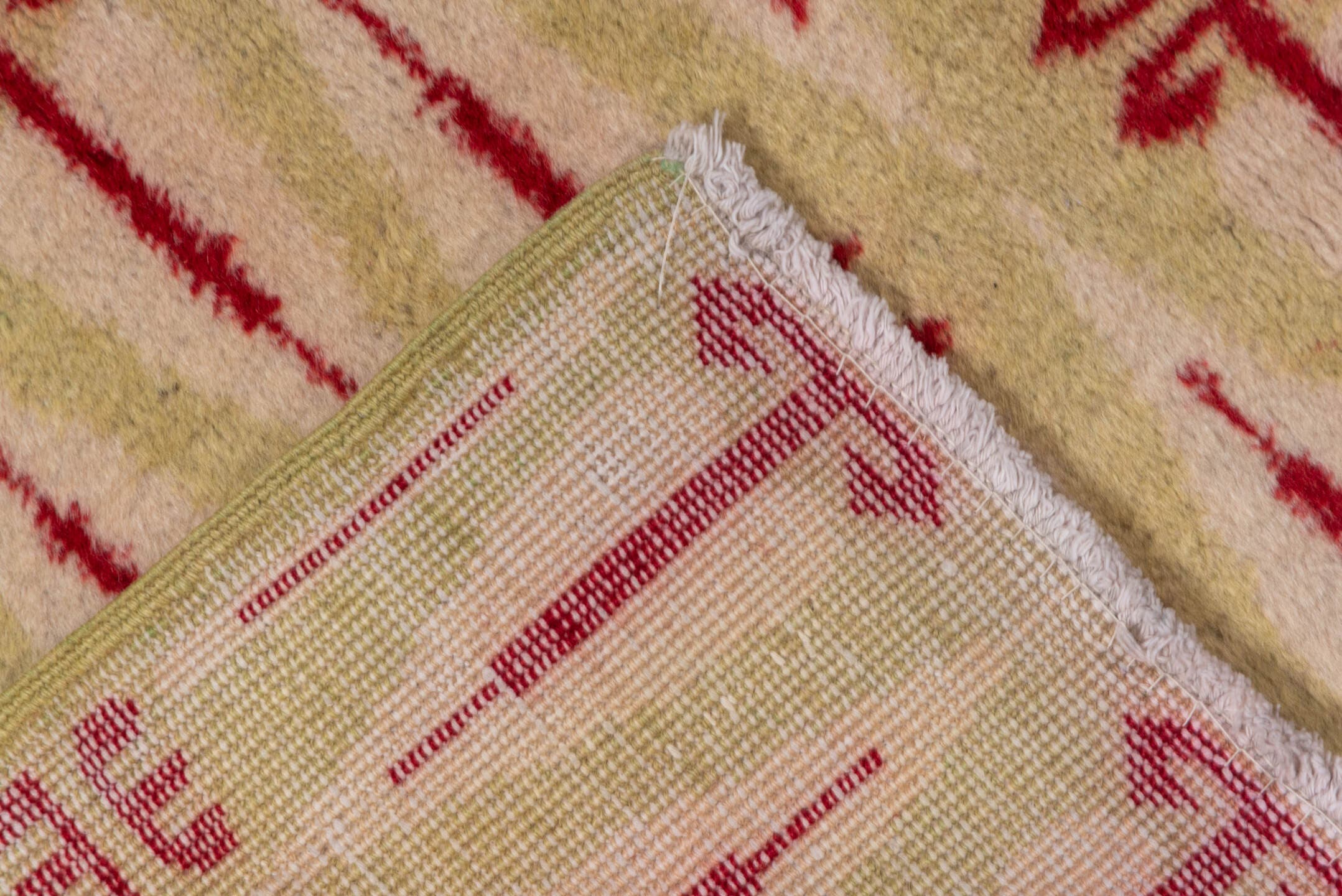 4' x 8' one-of-a-kind handmade vintage Zeki Muran rug. Color palette: ivory, crimson, cream, red