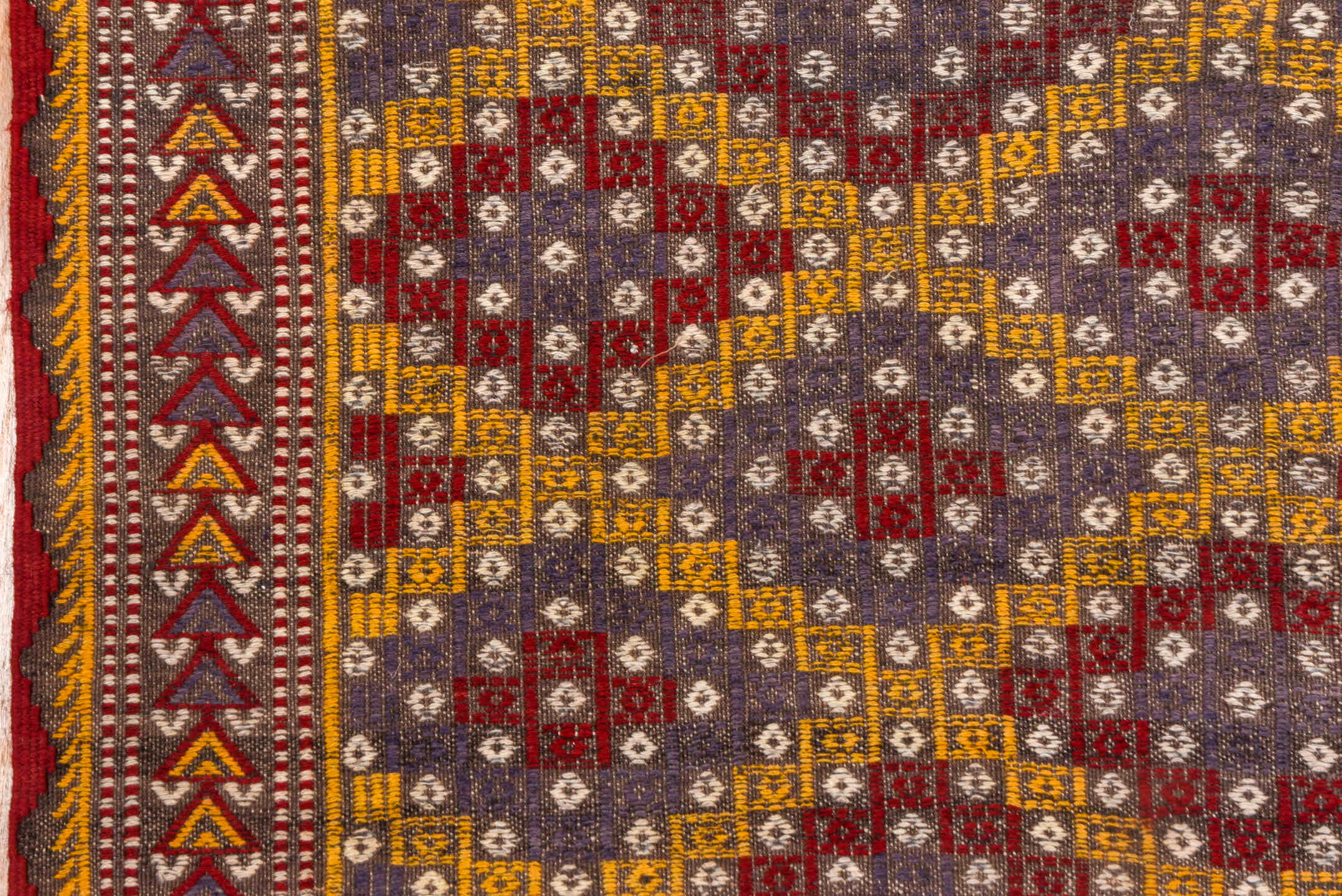 6' x 7' one-of-a-kind handmade vintage Jijim rug. Color palette: brown, gray, light gray, off-white, orange, pink, red, snow