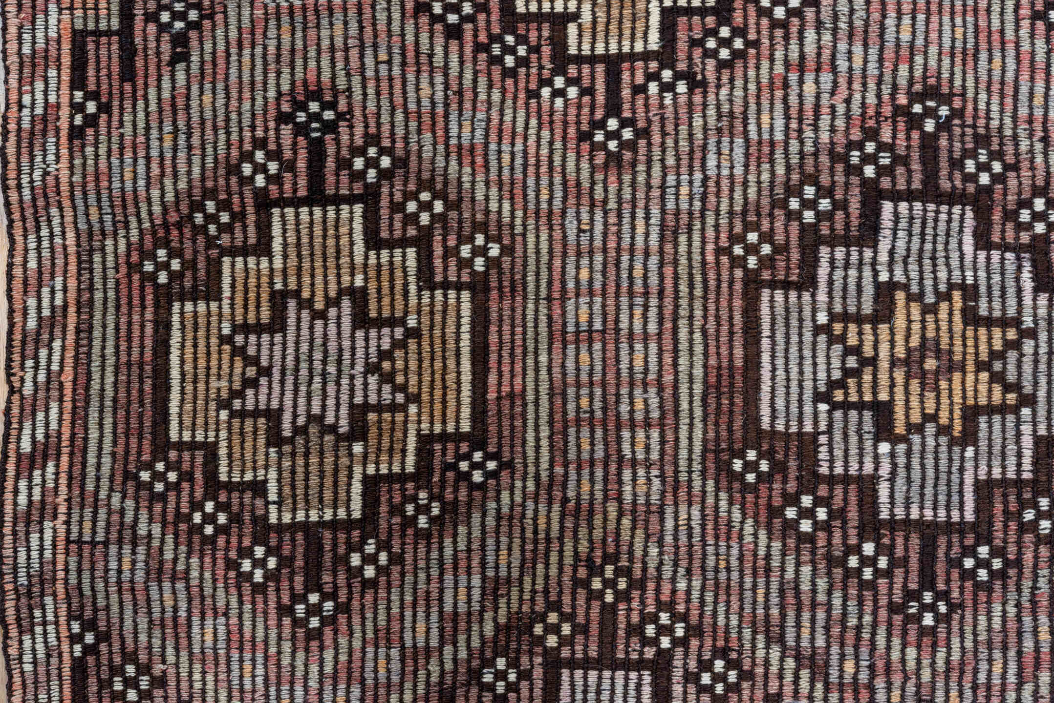 5' x 8' one-of-a-kind handmade vintage Jijim medium size rug. Color palette: black, brown, gray, light gray, off-white, pink