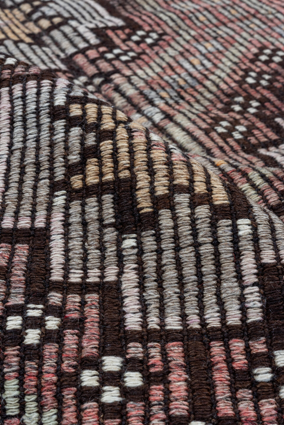 5' x 8' one-of-a-kind handmade vintage Jijim medium size rug. Color palette: black, brown, gray, light gray, off-white, pink