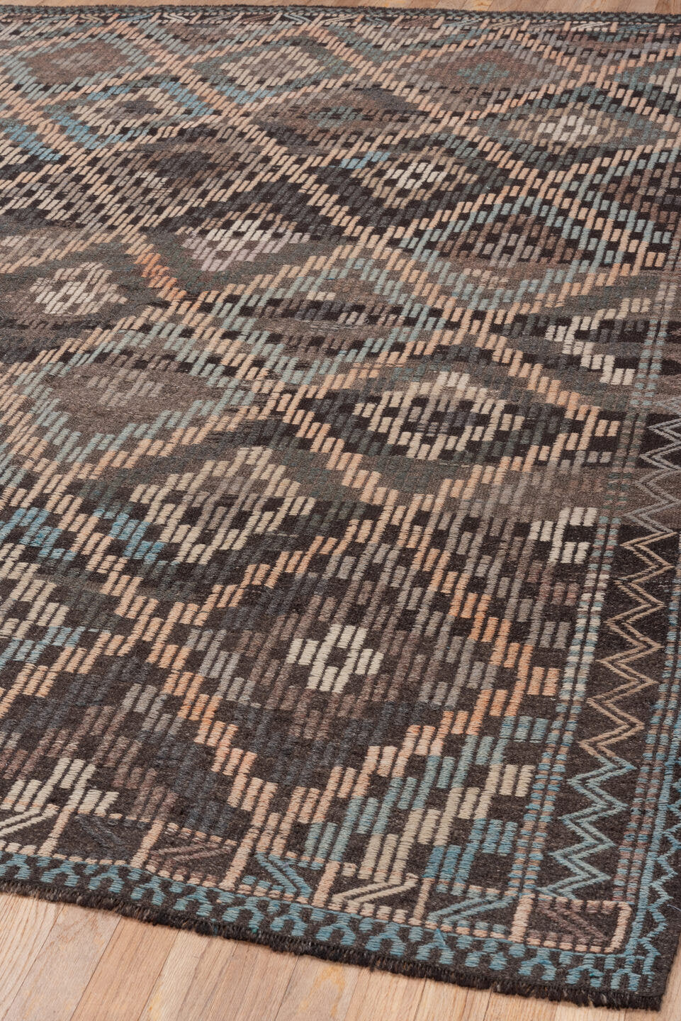6' x 8' one-of-a-kind handmade vintage Jijim medium size rug. Color palette: brown, charcoal, camel, taupe, ivory, turquoise