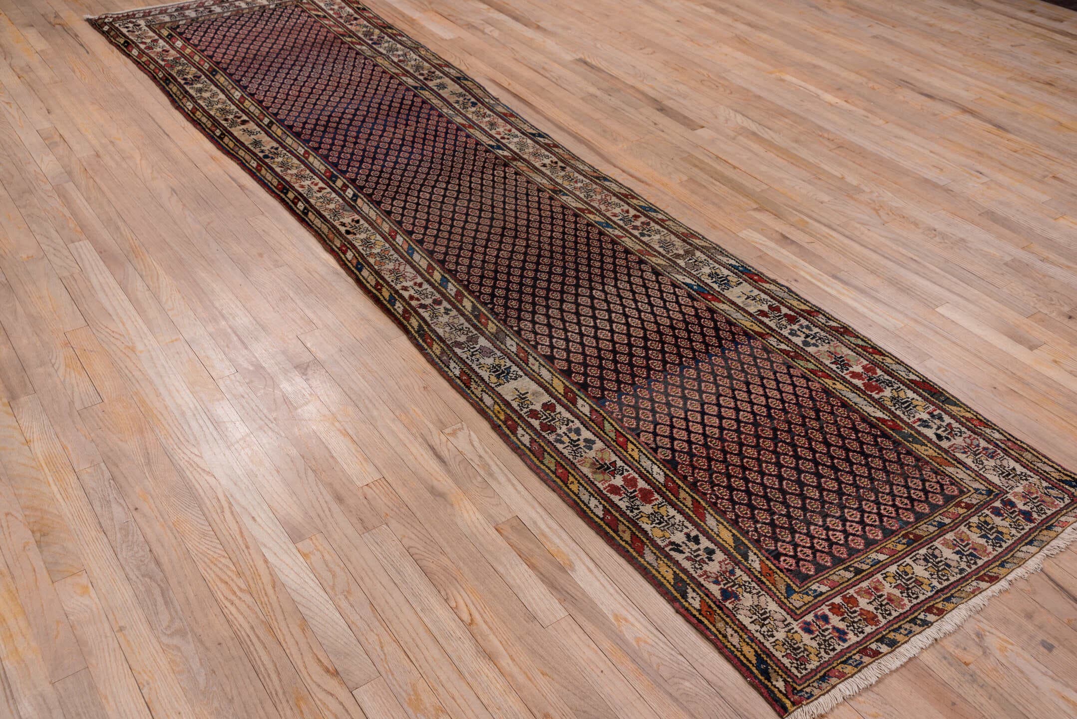 3' x 12' one-of-a-kind handmade antique Malayer runner rug. Color palette: navy, ivory, rust, burgundy, camel, indigo, gold