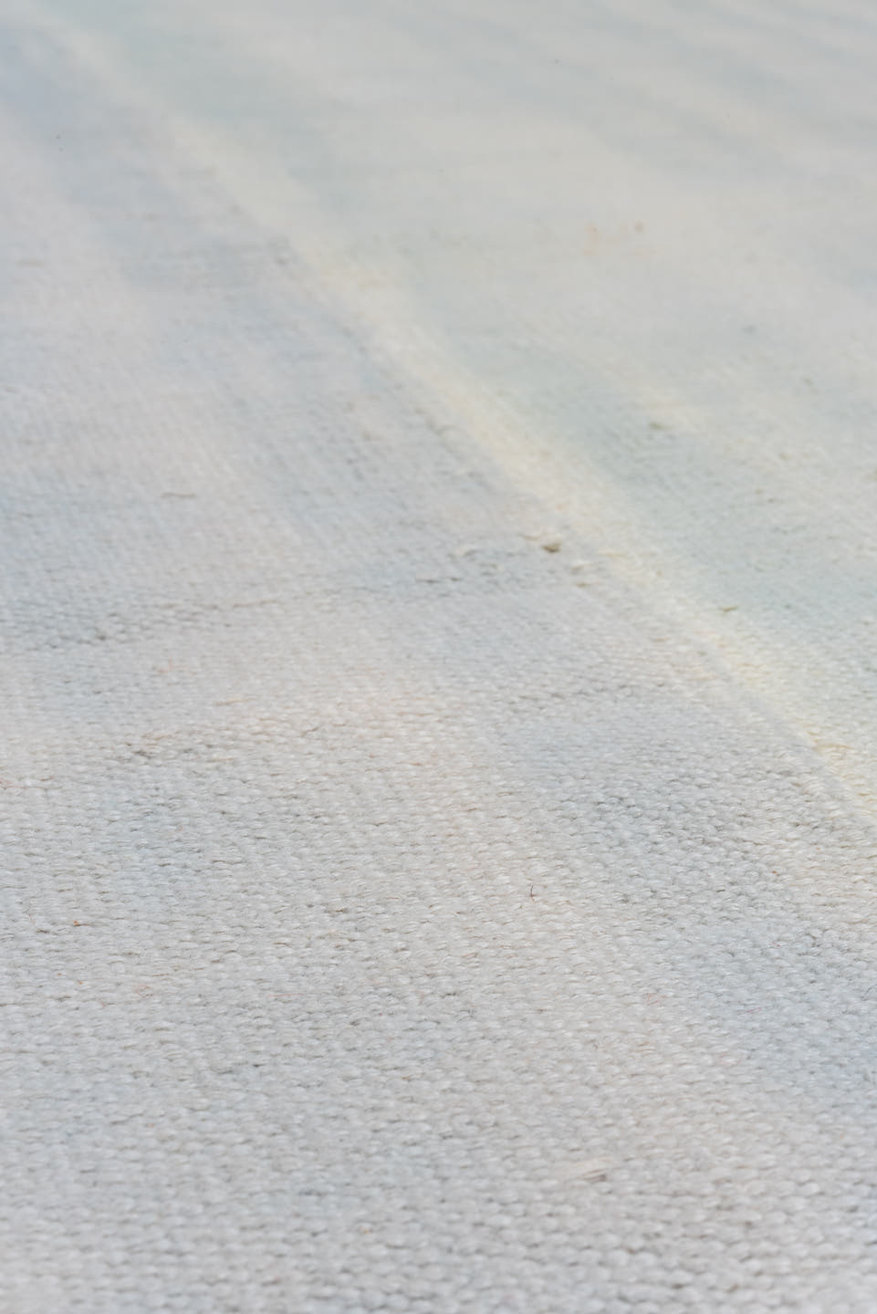 9' x 14' one-of-a-kind handmade antique Dhurrie large size rug. Color palette: ivory, pale blue, sky blue, light blue