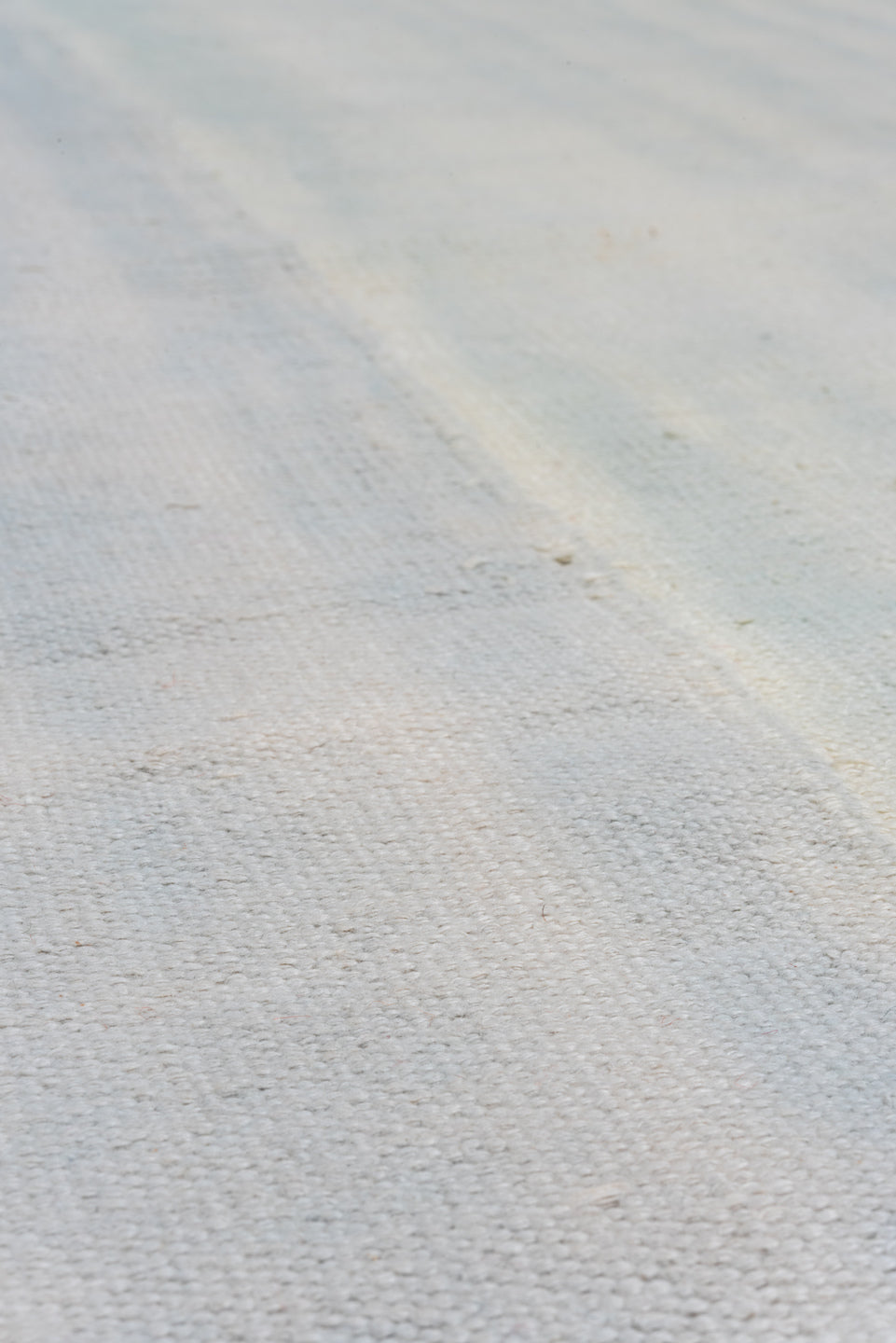 9' x 14' one-of-a-kind handmade antique Dhurrie large size rug. Color palette: ivory, pale blue, sky blue, light blue