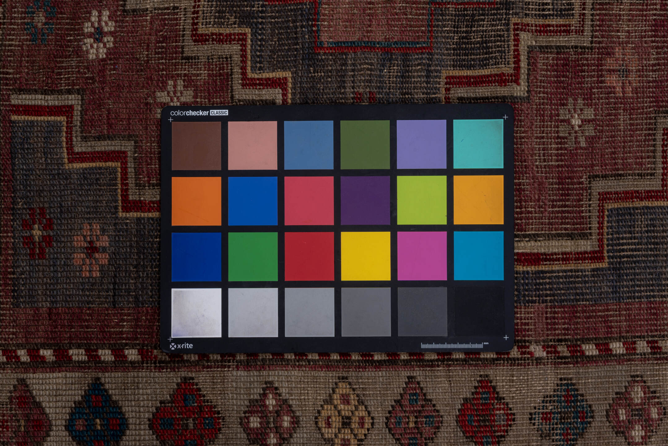 4' x 7' one-of-a-kind handmade antique Trans Caucasian rug. Color palette: rose, dusty rose, ivory, indigo, rust, taupe